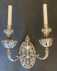 Magnifique paire d'appliques murales baroques « Putti » en bronze nickelé argenté de la marque Caldwell