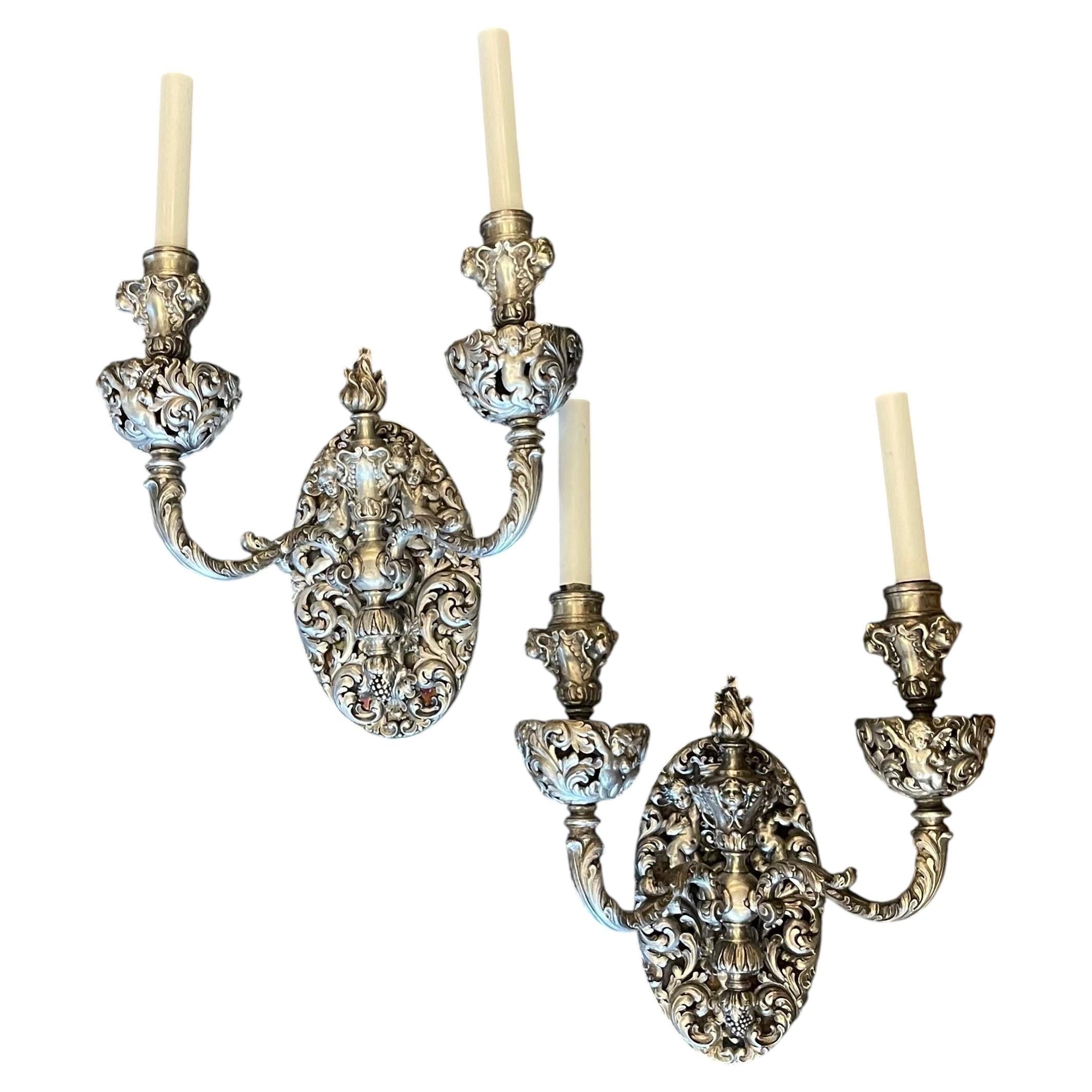 Wonderful Pair Caldwell Silvered Bronze Nickel Cherub Putti Baroque Wall Sconces For Sale