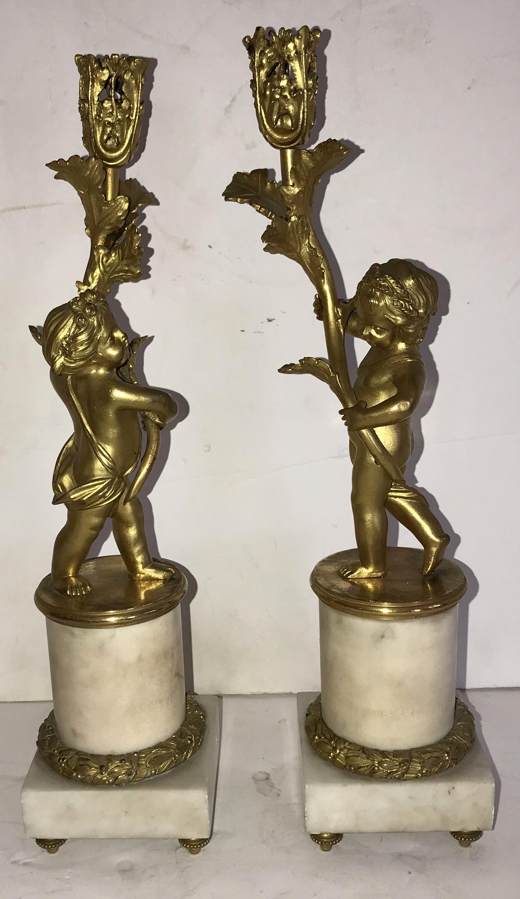 Wonderful Pair Cherub Dore Bronze Putti Figure Candelabra Ormolu Mounted Marble In Good Condition For Sale In Roslyn, NY