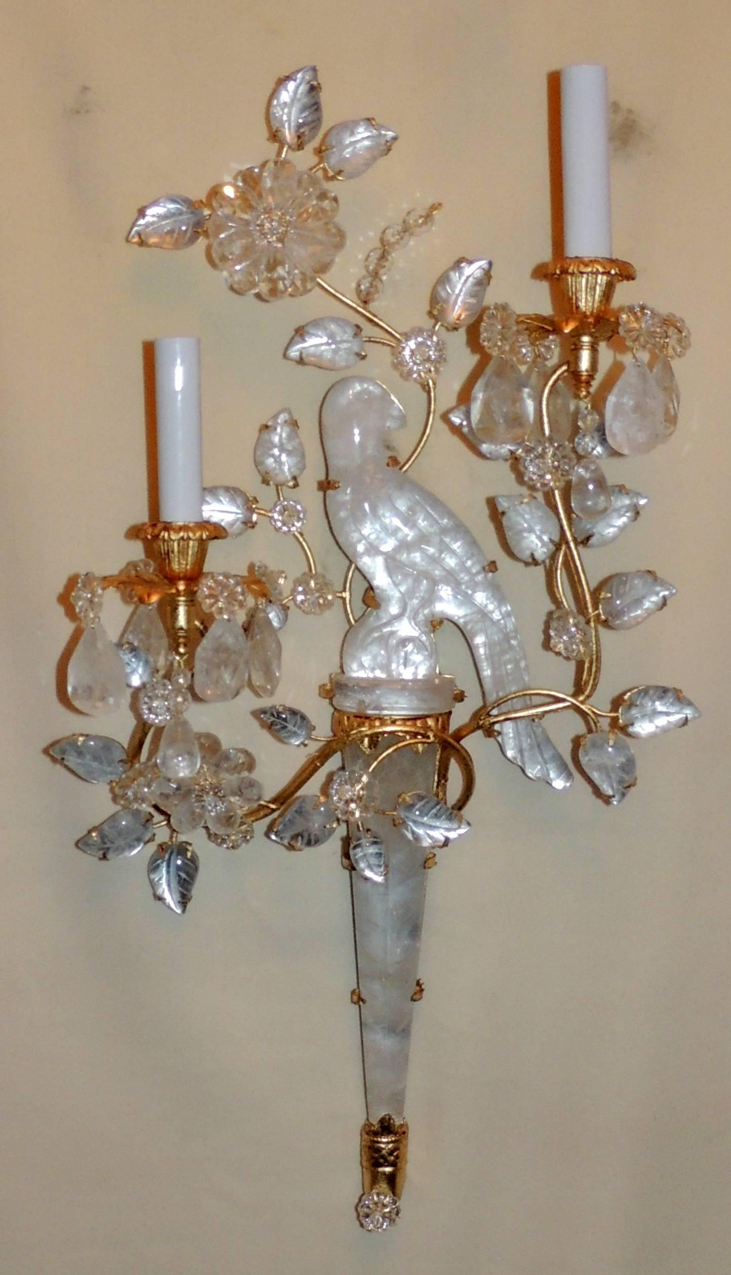 Wonderful pair of chinoiserie rock crystal Mid-Century Modern quartz bird form gold gilt two-light wall sconces in the manner of Baguès. Completely rewired with new sockets and wiring, each socket max of 60 watts.