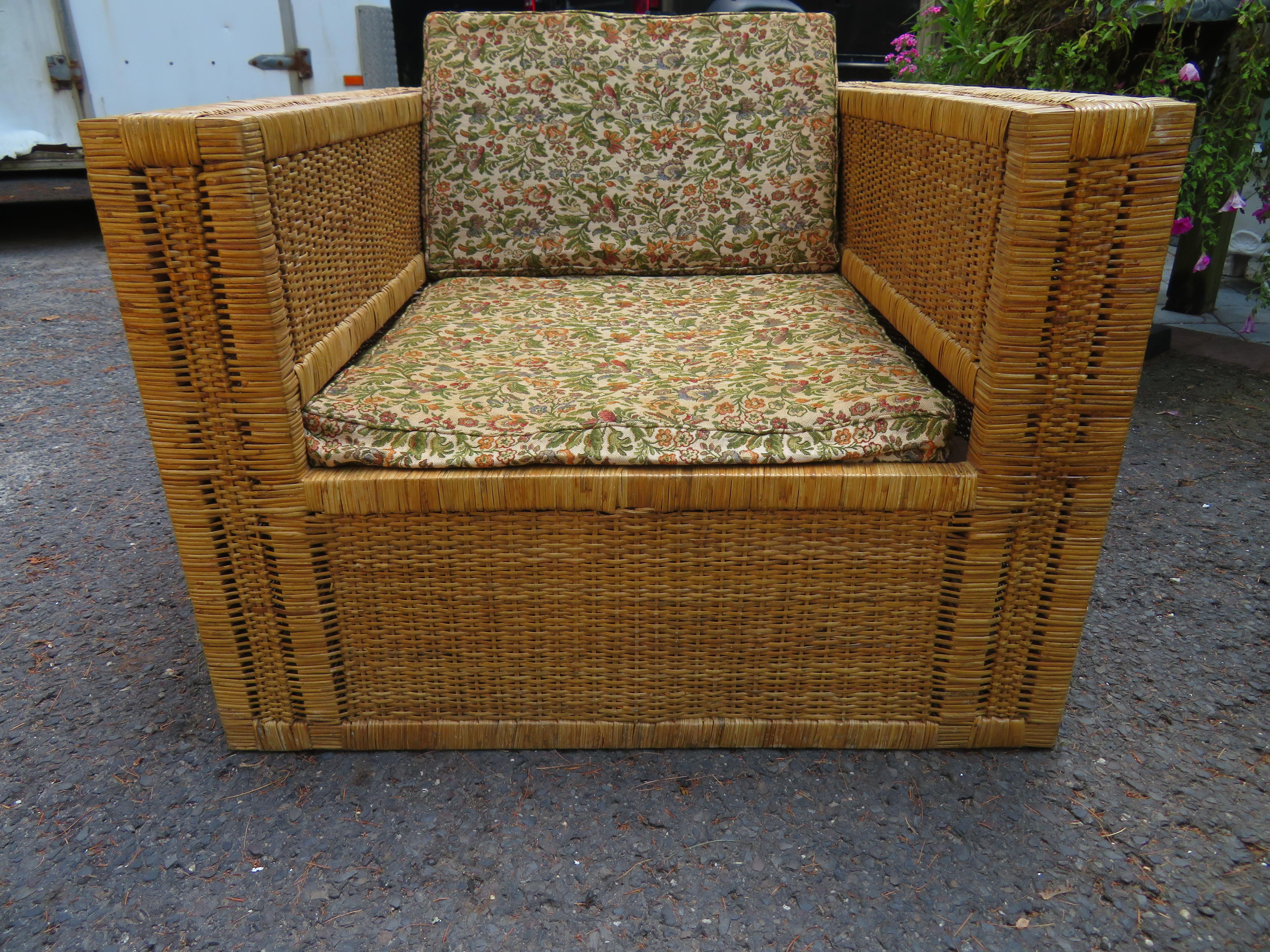 Wonderful pair of Danny Ho Fong style wicker cube Parson chairs. This set will need new cushions which we can certainly help with. The wicker is in great shape and has only light signs of age. We do have other pieces from this collection-as shown in
