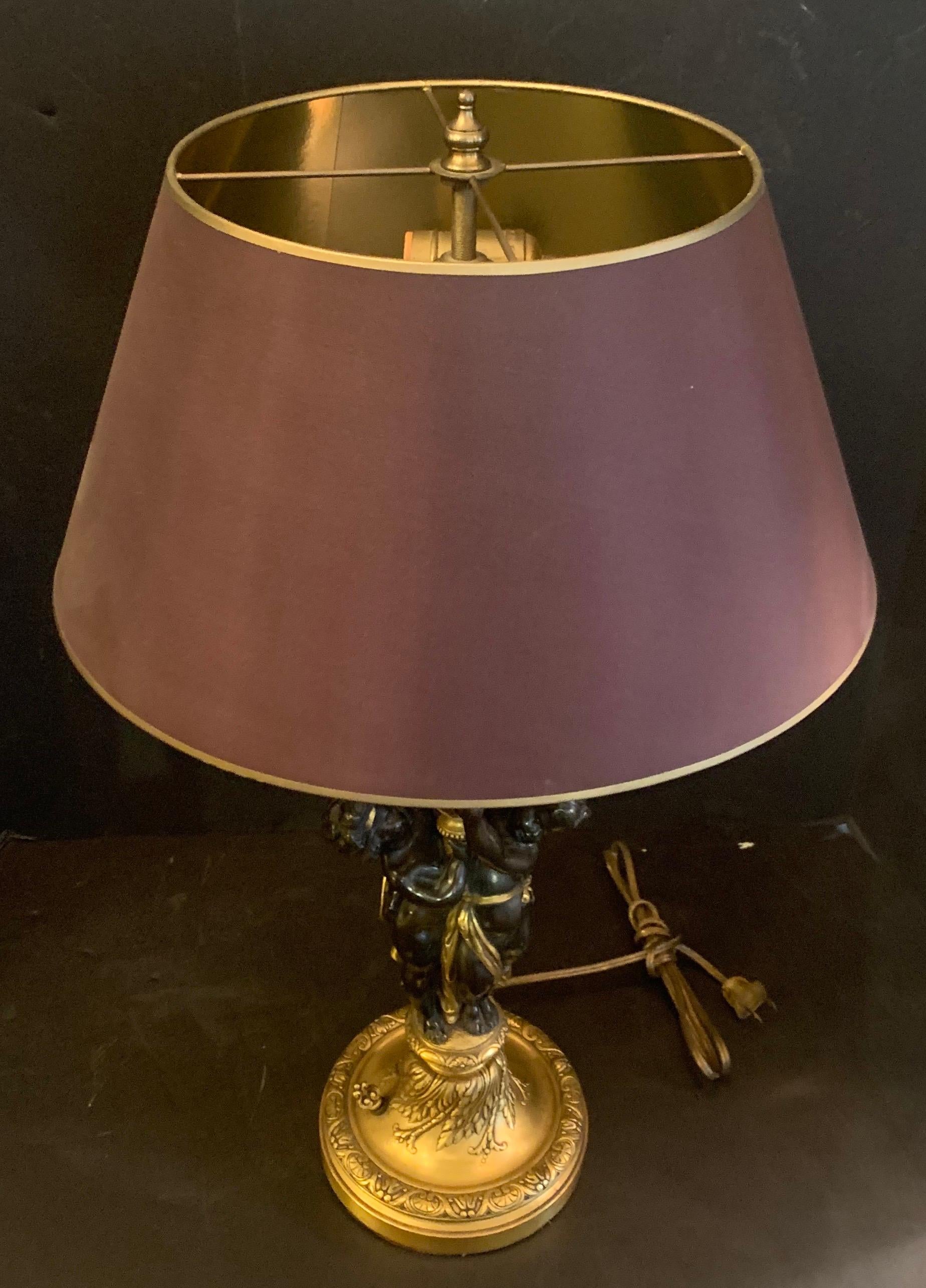 Belle Époque Wonderful Pair E.F. Caldwell Stamped French Bronze Patinated Putti Cherub Lamps