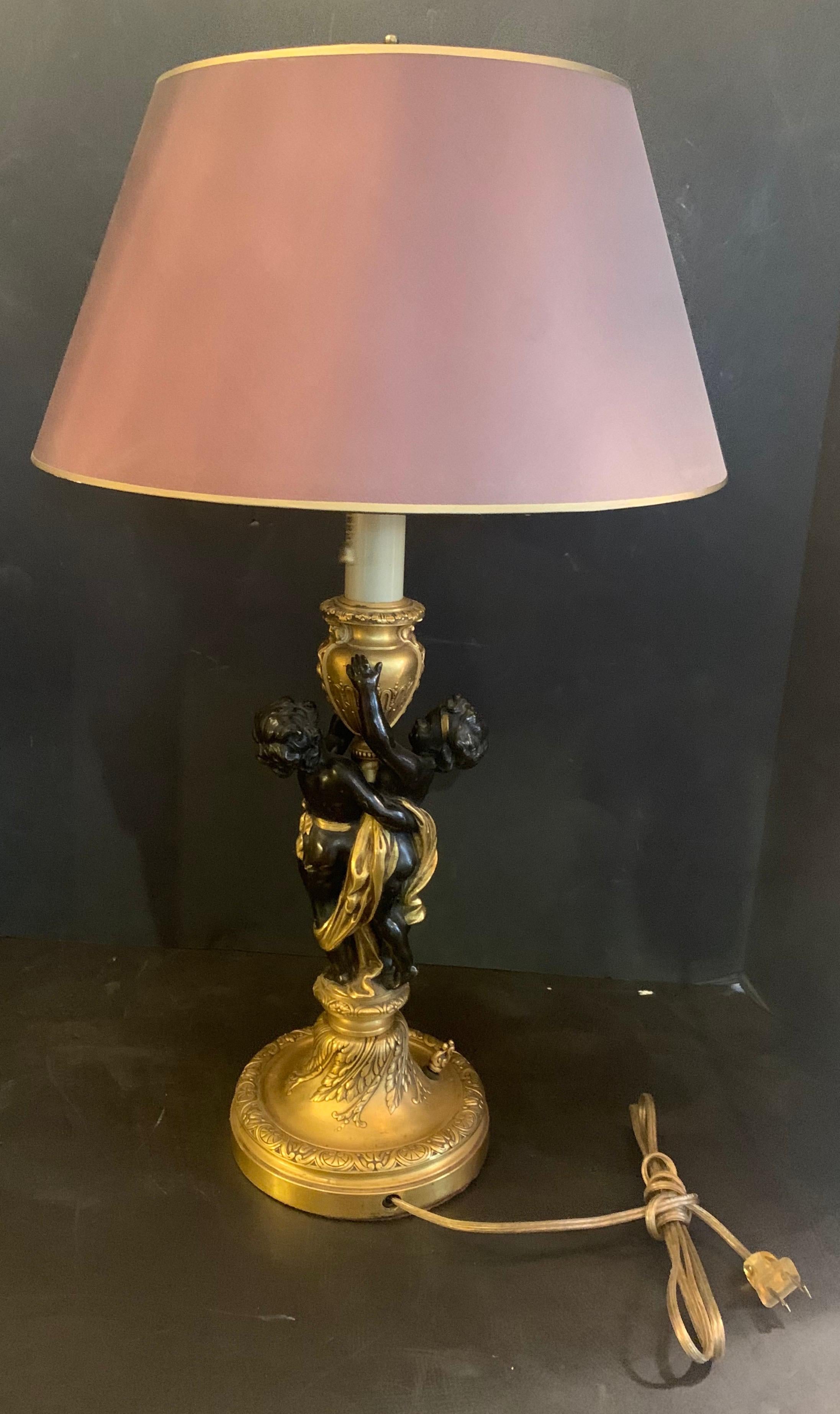 Wonderful Pair E.F. Caldwell Stamped French Bronze Patinated Putti Cherub Lamps In Good Condition In Roslyn, NY