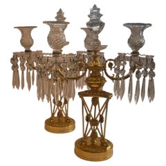 Magnifique paire de candélabres néoclassiques de style Empire en bronze doré et cristal de Baccarat