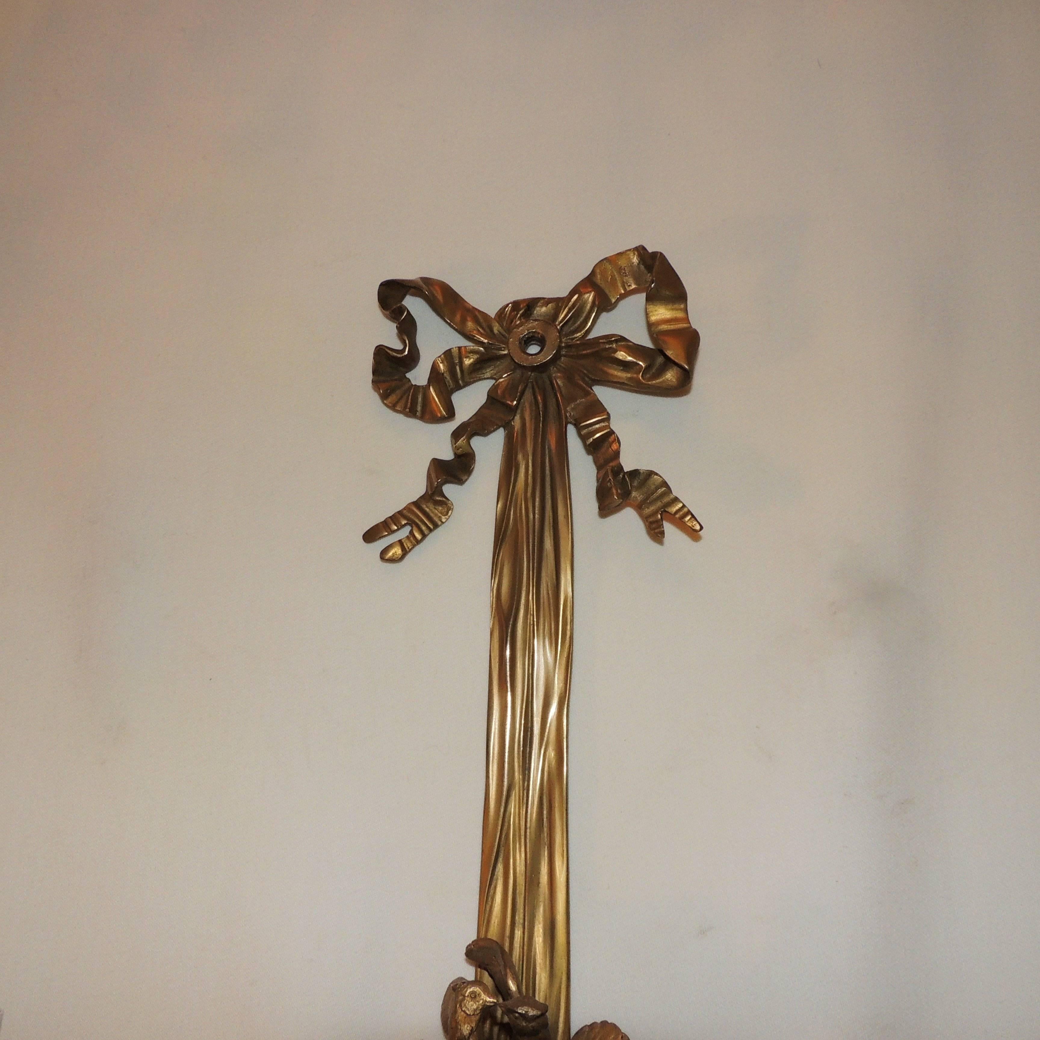 Belle Époque Wonderful Pair French Dore Bronze Bow Love Birds Tassel Swag Three-Arm Sconces For Sale