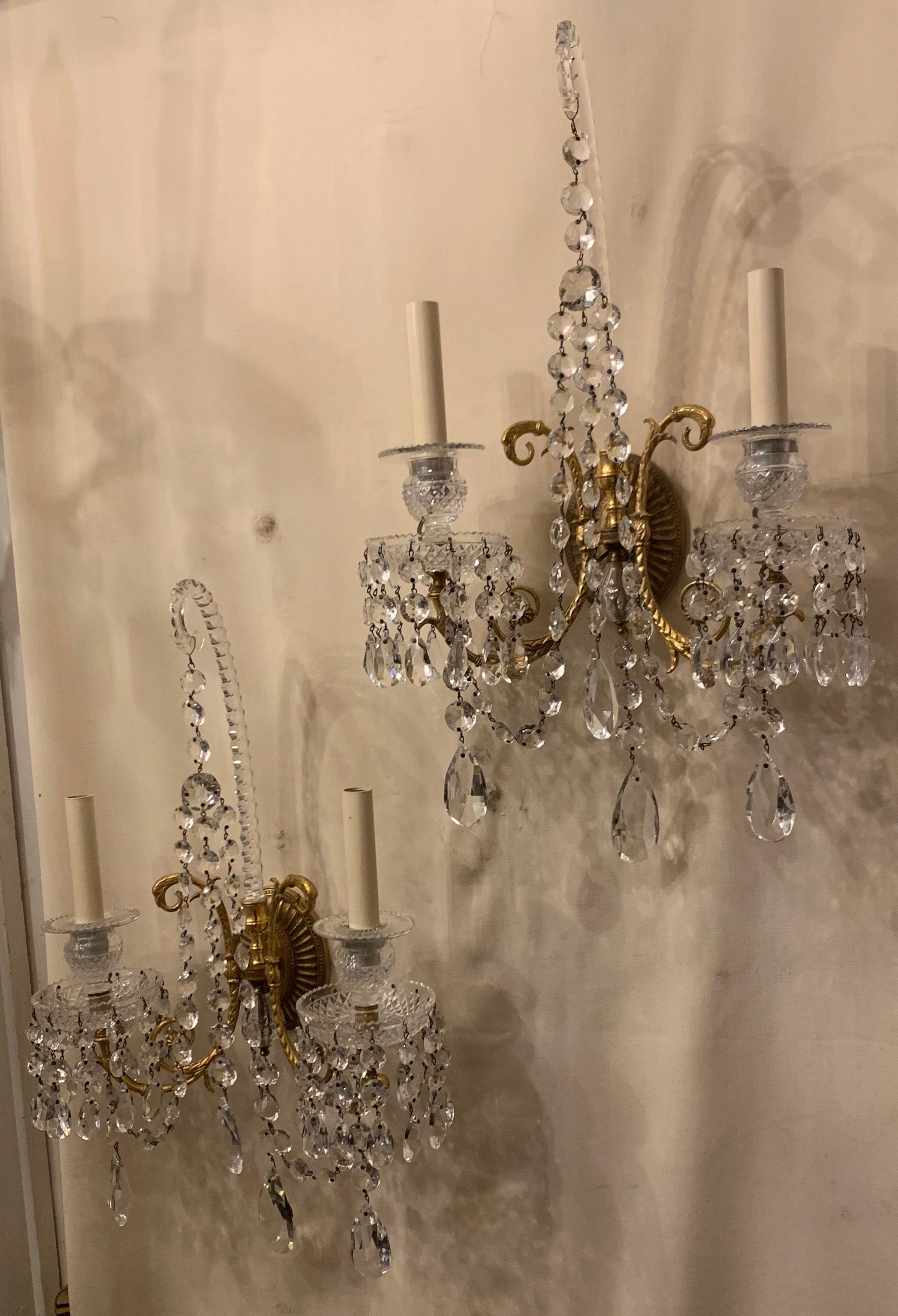 Wonderful pair of French doré bronze and crystal neoclassical, Regency, Empire two-light candelabra sconces
Rewired and ready to enjoy.