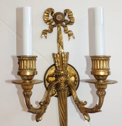 Pair of French Gilt Doré Bronze Bow Torchiere Caldwell Two-Light Sconces