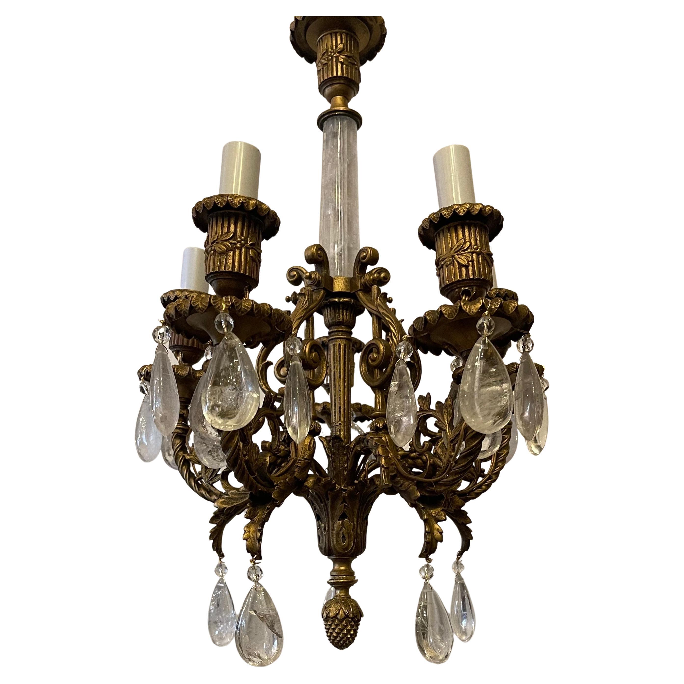 A Wonderful Pair Of French Louis XVI Style Bronze & Rock Crystal Petite Five-Arm Chandeliers Completely Rewired With New Sockets And Accompanied By Chain And Canopy