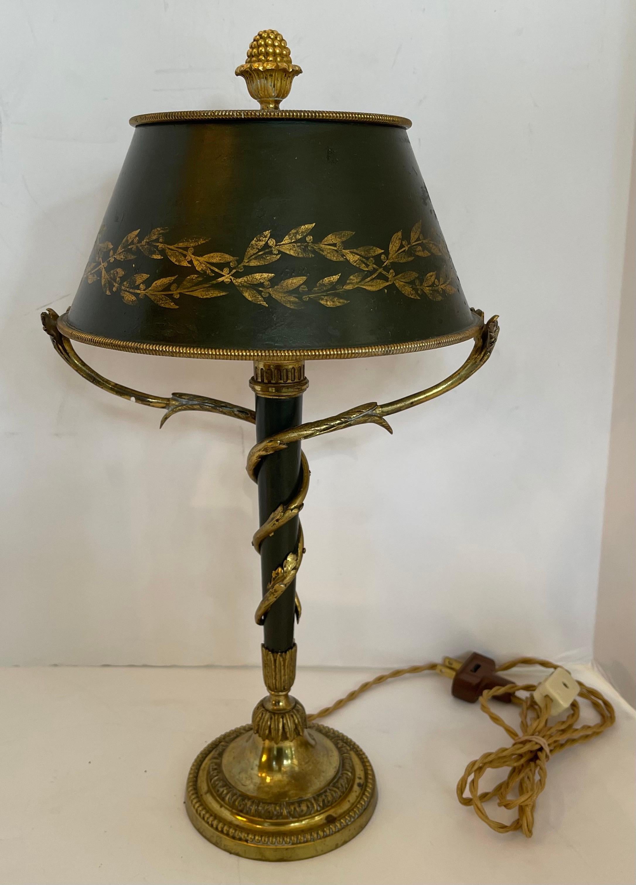 Wonderful pair of French signed Henri beau gilt bronze petite Bouillotte lamps with hand painted tole shades.