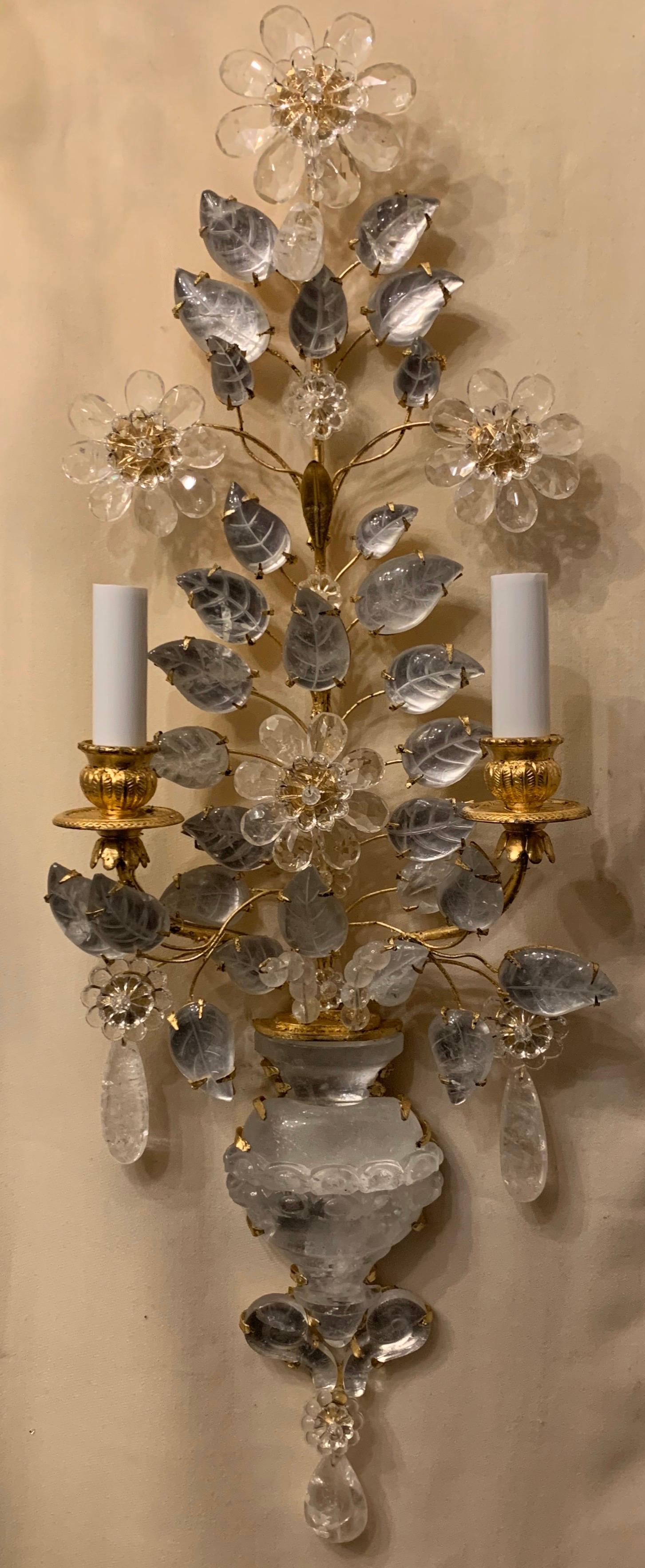 A wonderful pair of Italian petite rock crystal Baguès style urn and flower form sconces retailed by nestle NYC
Completely rewired with new sockets and wiring.