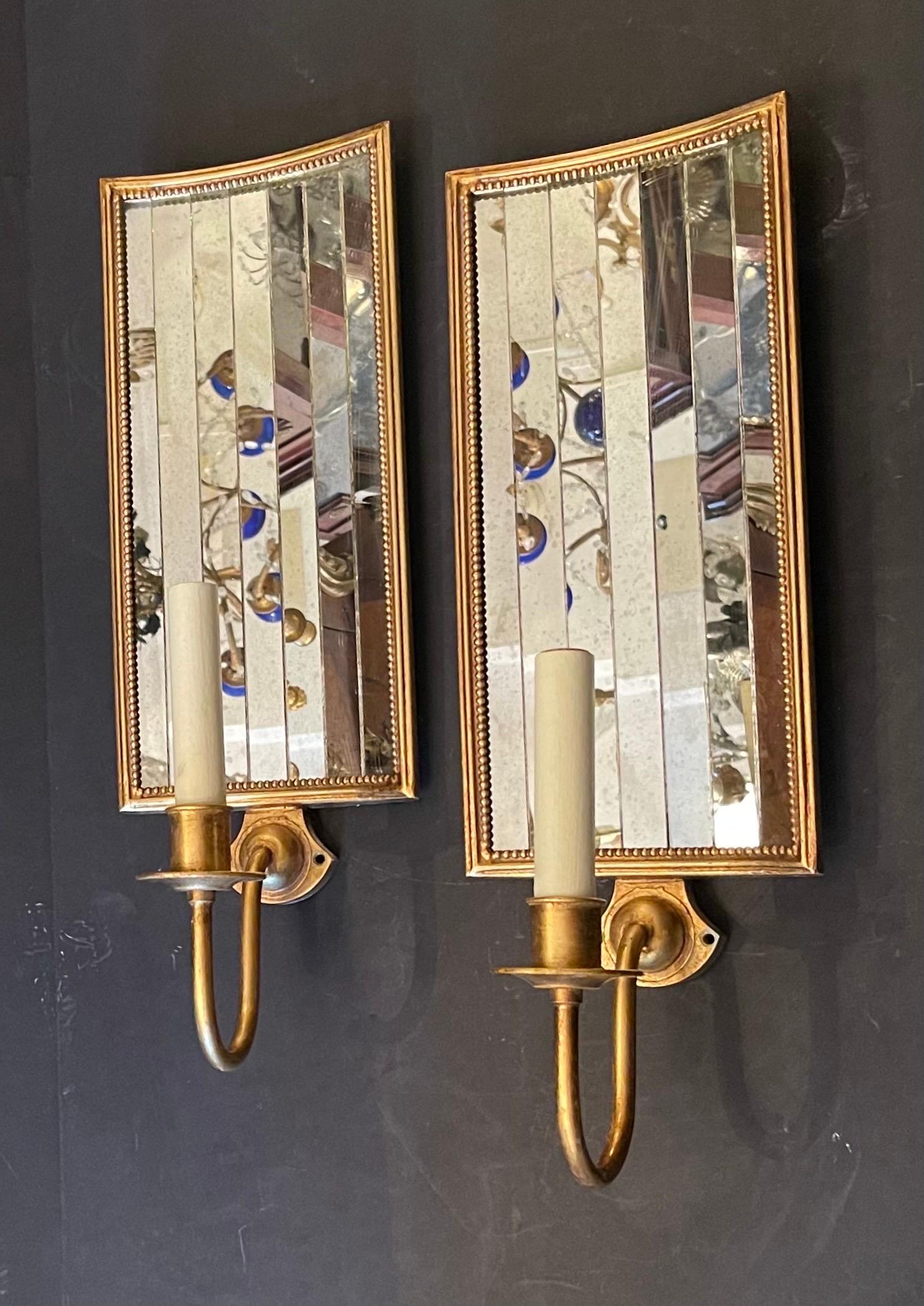 A Wonderful Pair Of Large Vaughan Designs Tole Gold Gilt With Inset Mirror Strips Panel Wall Sconces 
Item# WA0068 