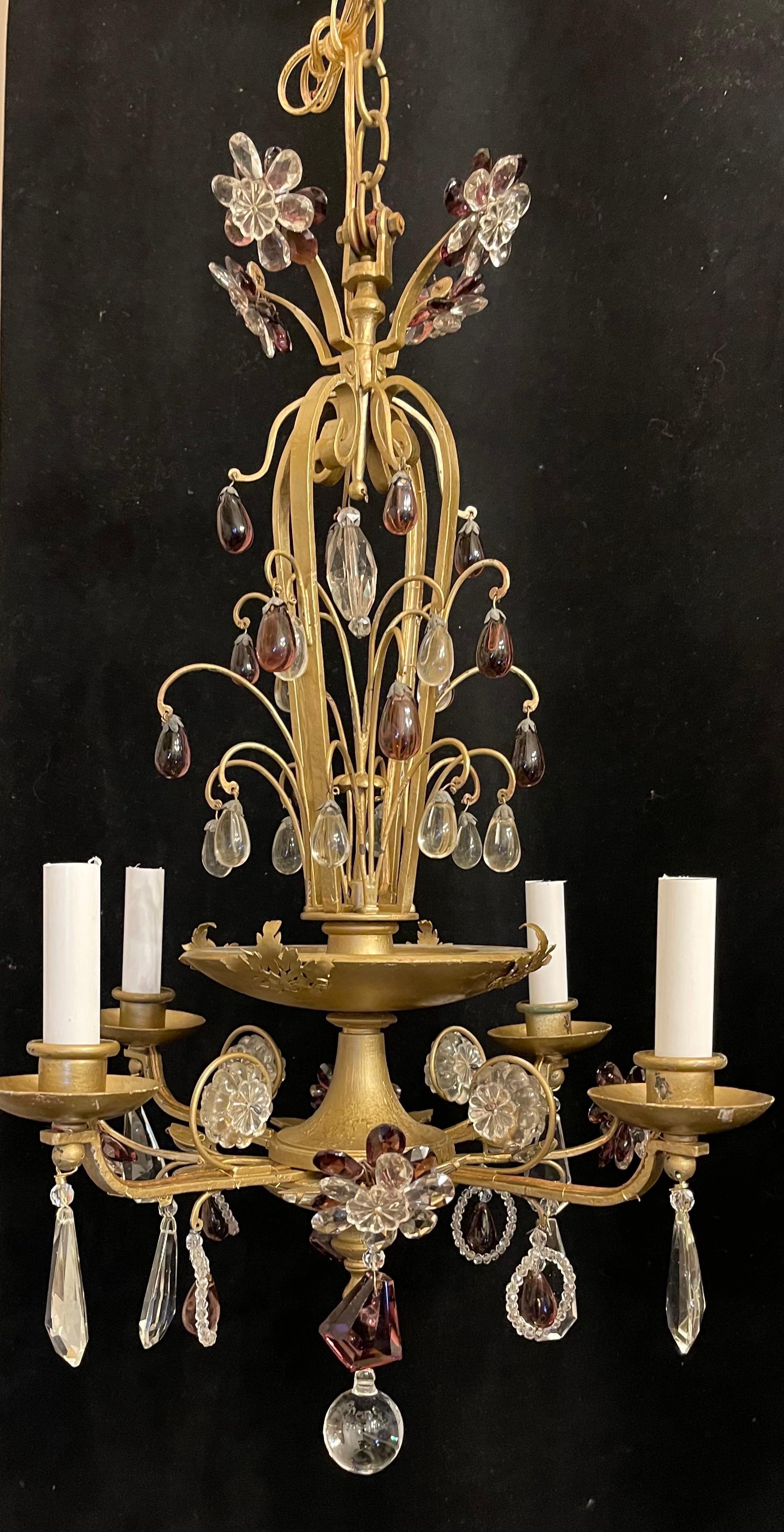 A wonderful pair of maison bagues style amethyst crystal beaded & gilt wood chandeliers