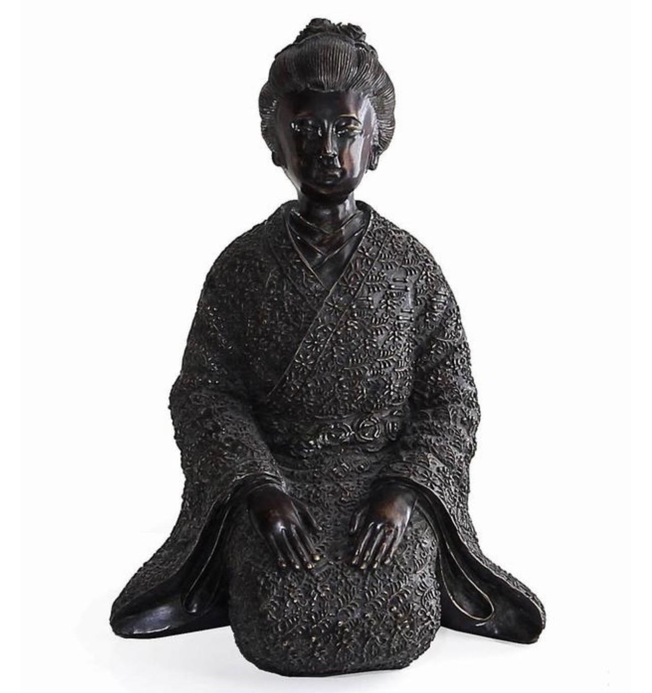 A beautiful pair of Japanese inspired bronze statues by the Maitland-Smith company. Includes one geisha figure and one samurai, both in a kneeling position. Details on the figures, robes, faces and hair are done in high relief with high level