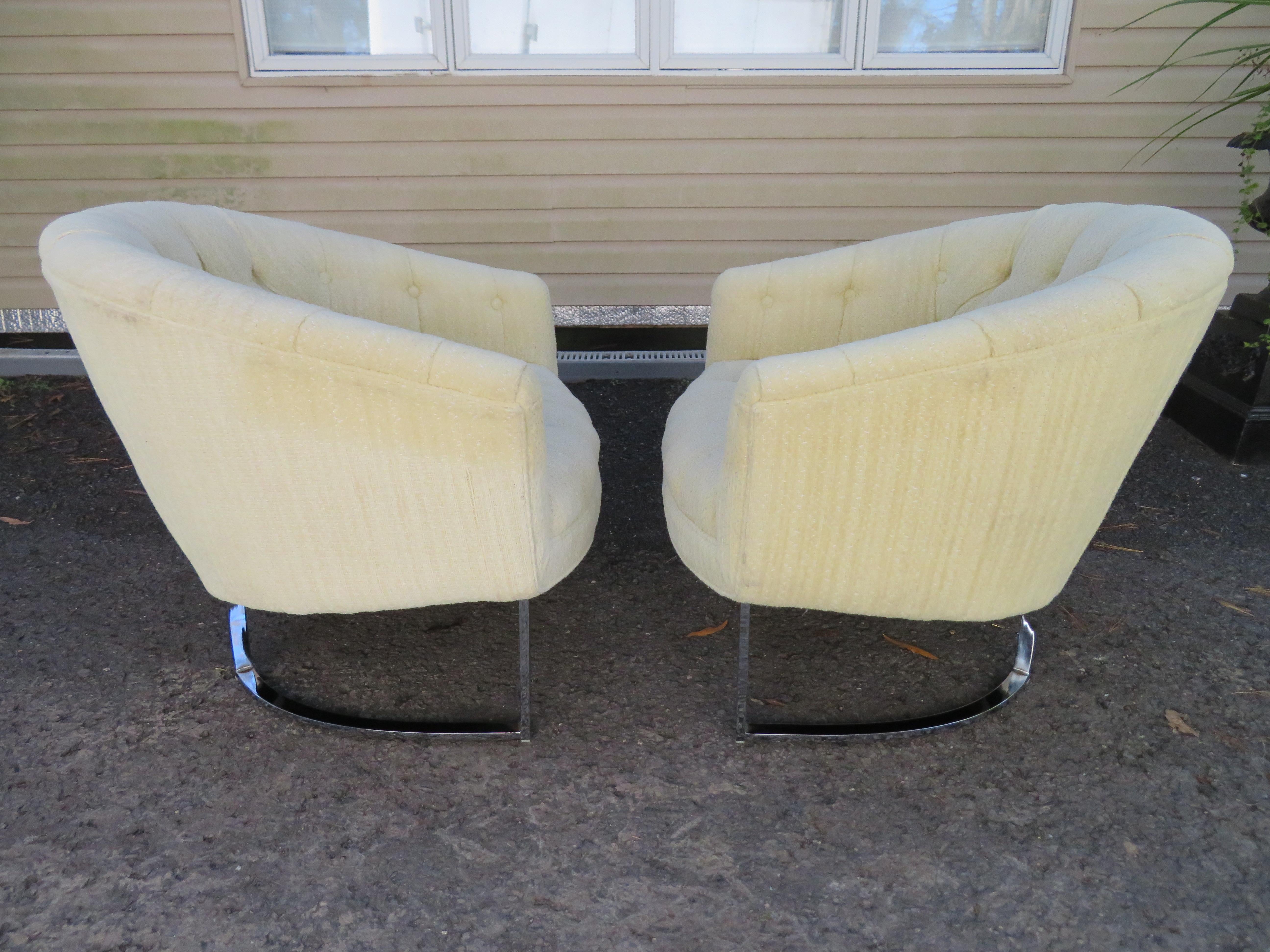 Wonderful pair of Milo Baughman style of tufted barrel back tub chairs. The original upholstery still looks good with only some minor wear-some light spots to seat.
