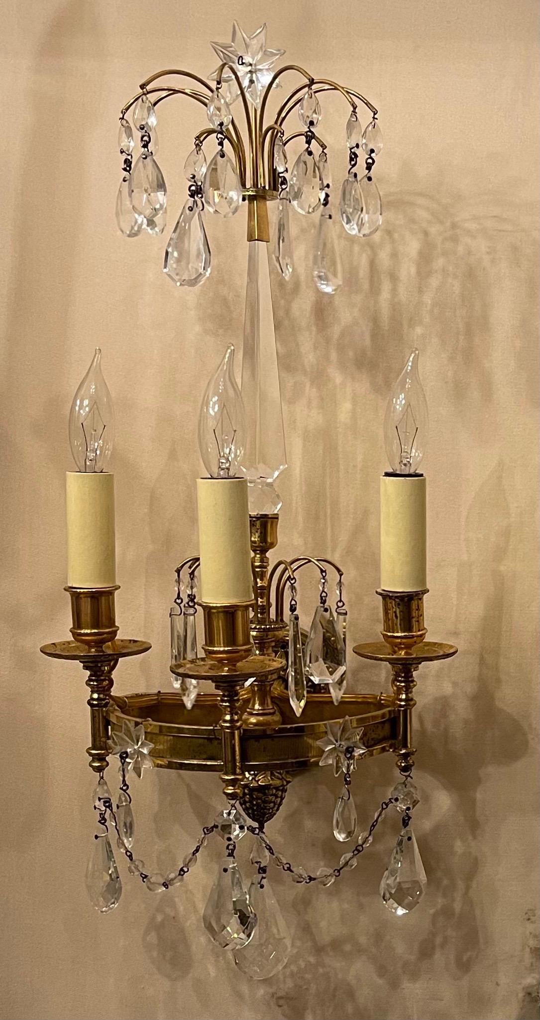 A wonderful pair of neoclassical, regency, empire, Baltic dore bronze & crystal sconces with crystal center spike leading to a cluster bouquet.
 