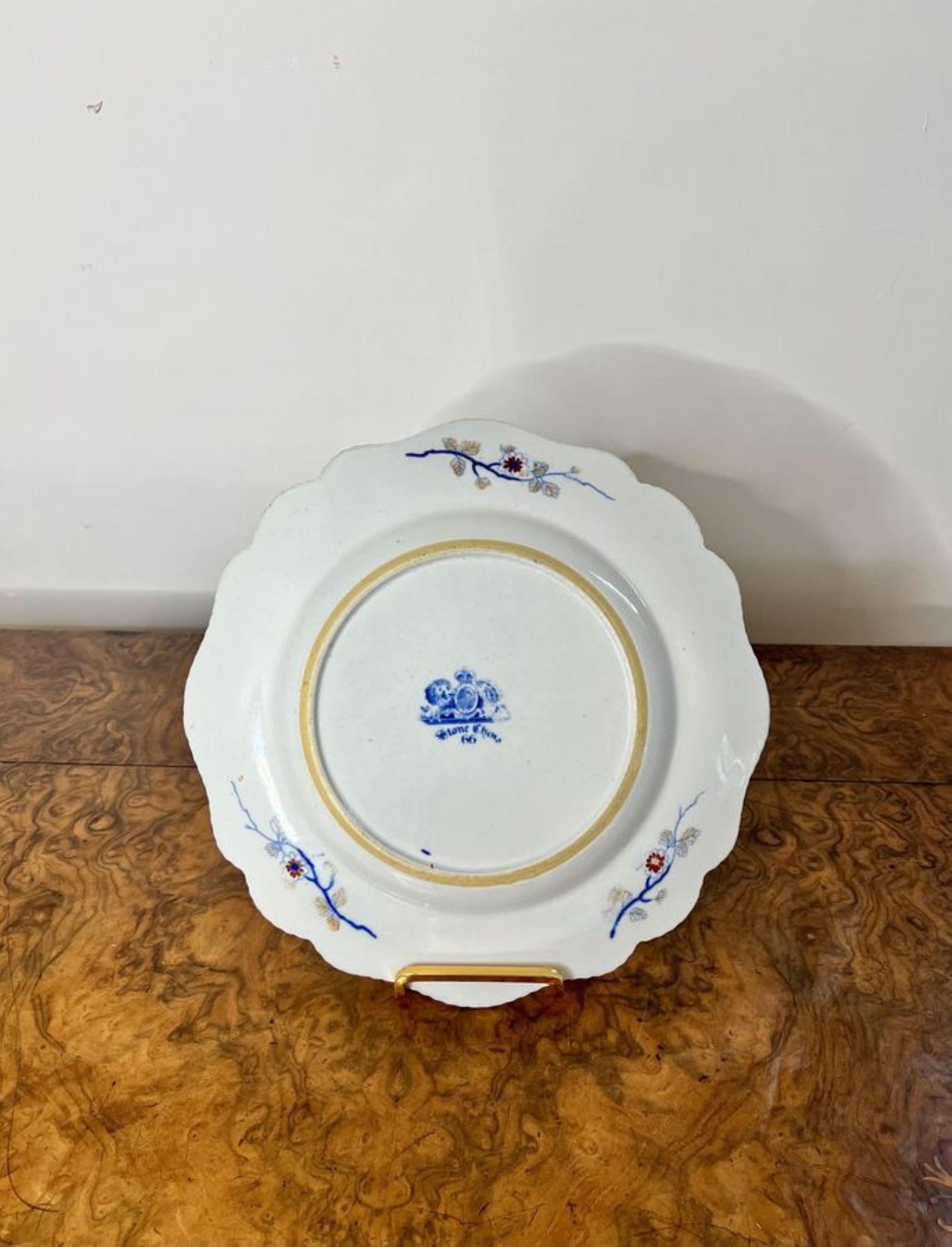 Wonderful pair of antique Georgian stone china plates, having a fantastic shaped edge, decorated in an authentic imari style pattern with flowers, leaves and scrolls hand painted in red, blue, gold and white colours. 
Stamped to bases as shown '