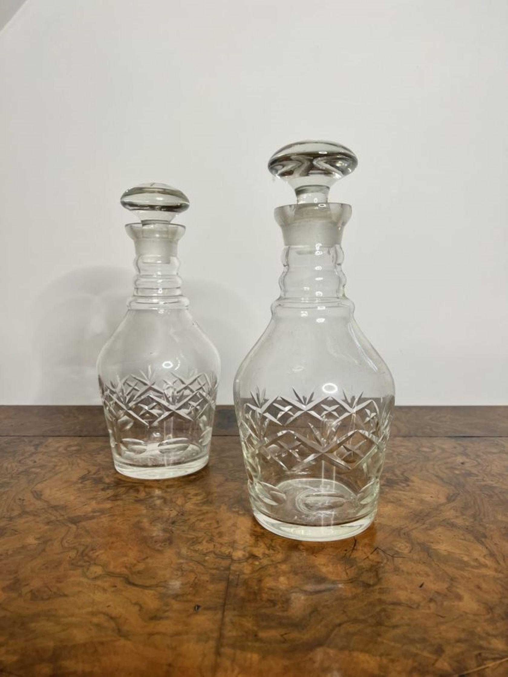 Wonderful pair of antique Victorian cut glass decanters having a pair of Victorian decanters with wonderful cut glass detail with the original cut glass stoppers.

D. 1880