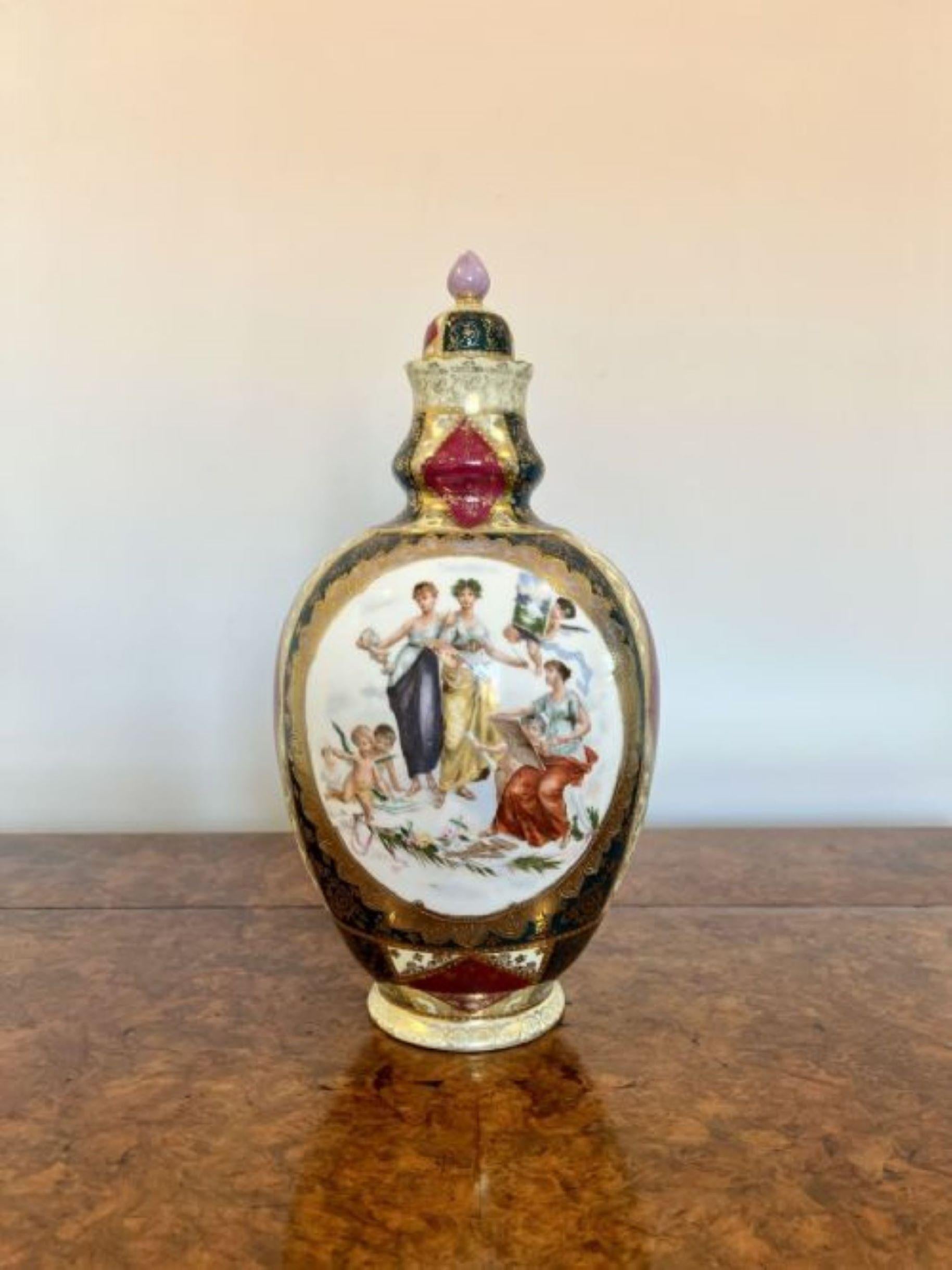 Wonderful pair of antique Victorian quality porcelain lidded vases having a quality pair of antique Victorian porcelain vases with wonderful hand painted decoration in beautiful red, blue, green, yellow, orange and gold colours. 