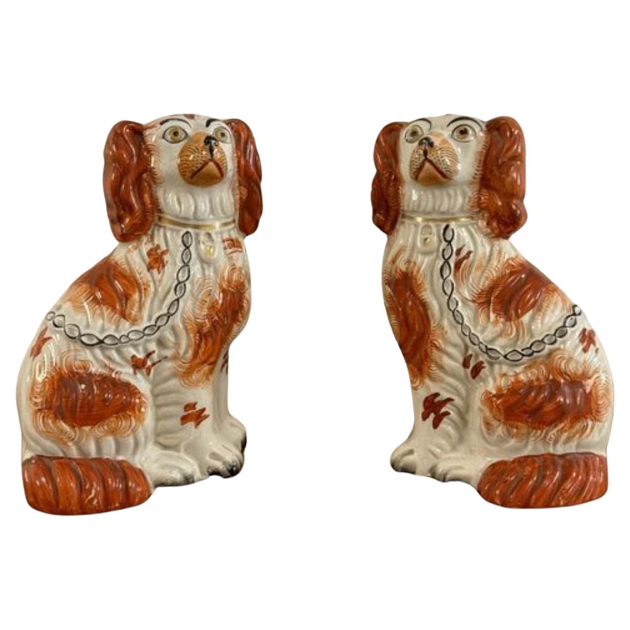Wonderful pair of antique Victorian seated spaniels