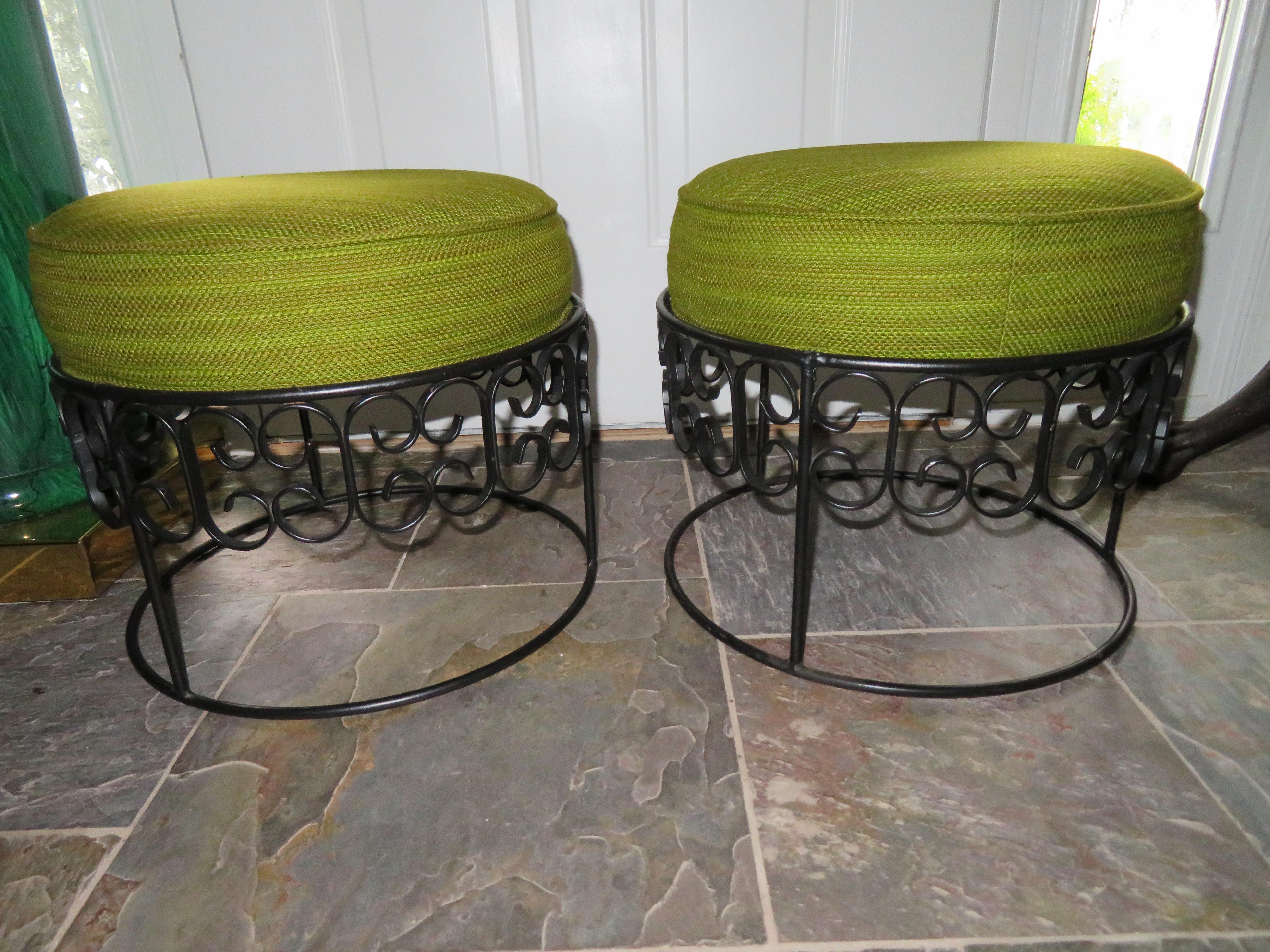 Wonderful pair of Arthur Umanoff stacking stools from the 1964 Grenada Collection for Boyuer Scott, Shaver Howard collections. This pair is in wonderful vintage condition with a lovely lime green lightly ribbed wool fabric and black painted iron