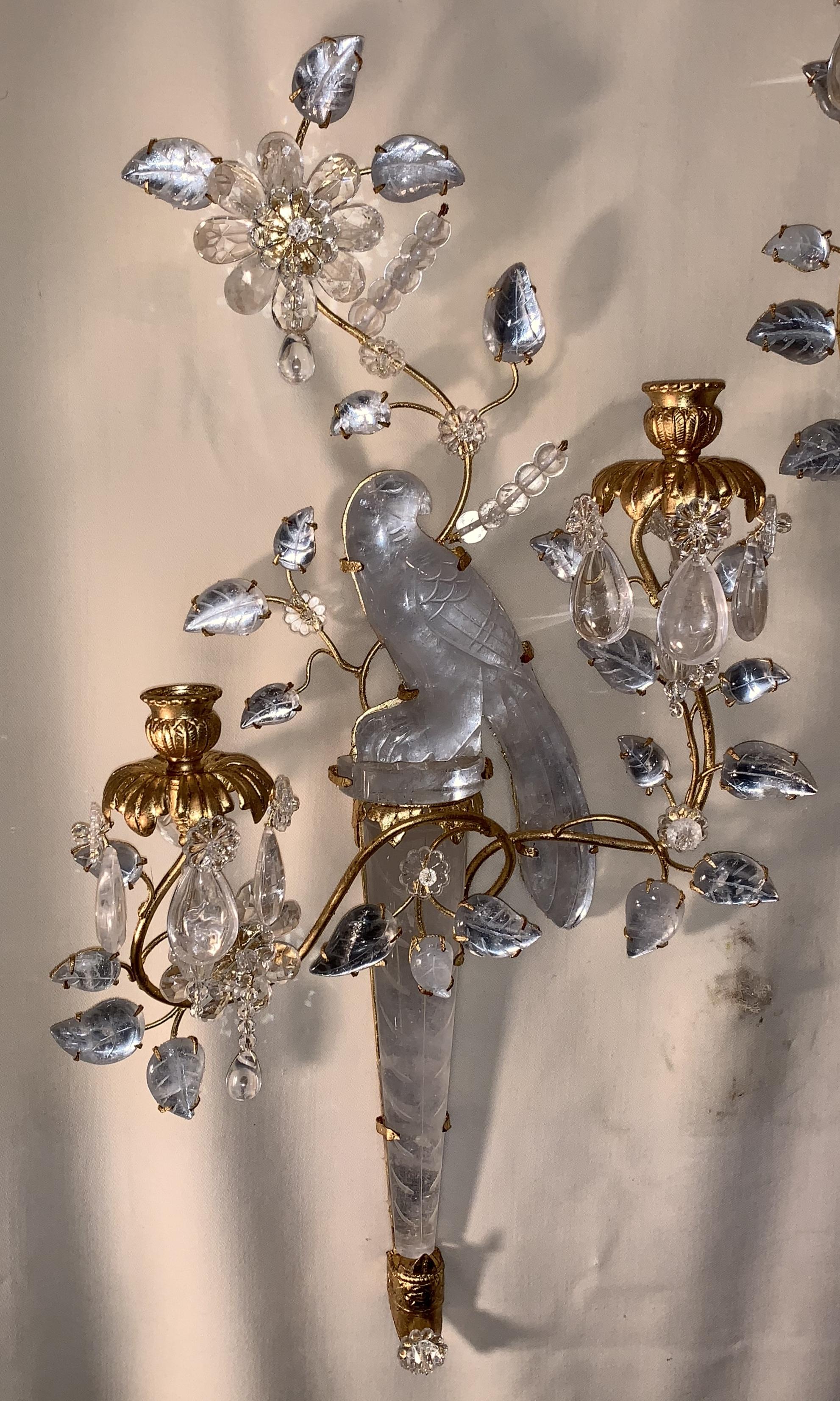 A wonderful pair of chinoiserie style rock crystal two-arm with gold gilt bird and flower form sconces facing one another. By far the best pair we have ever had.

Currently not electrified
$250 to have wired if you desire.
 