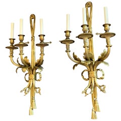 Wonderful Pair of French Bronze Caldwell Three-Arm Ribbon Bow Tassel Sconces