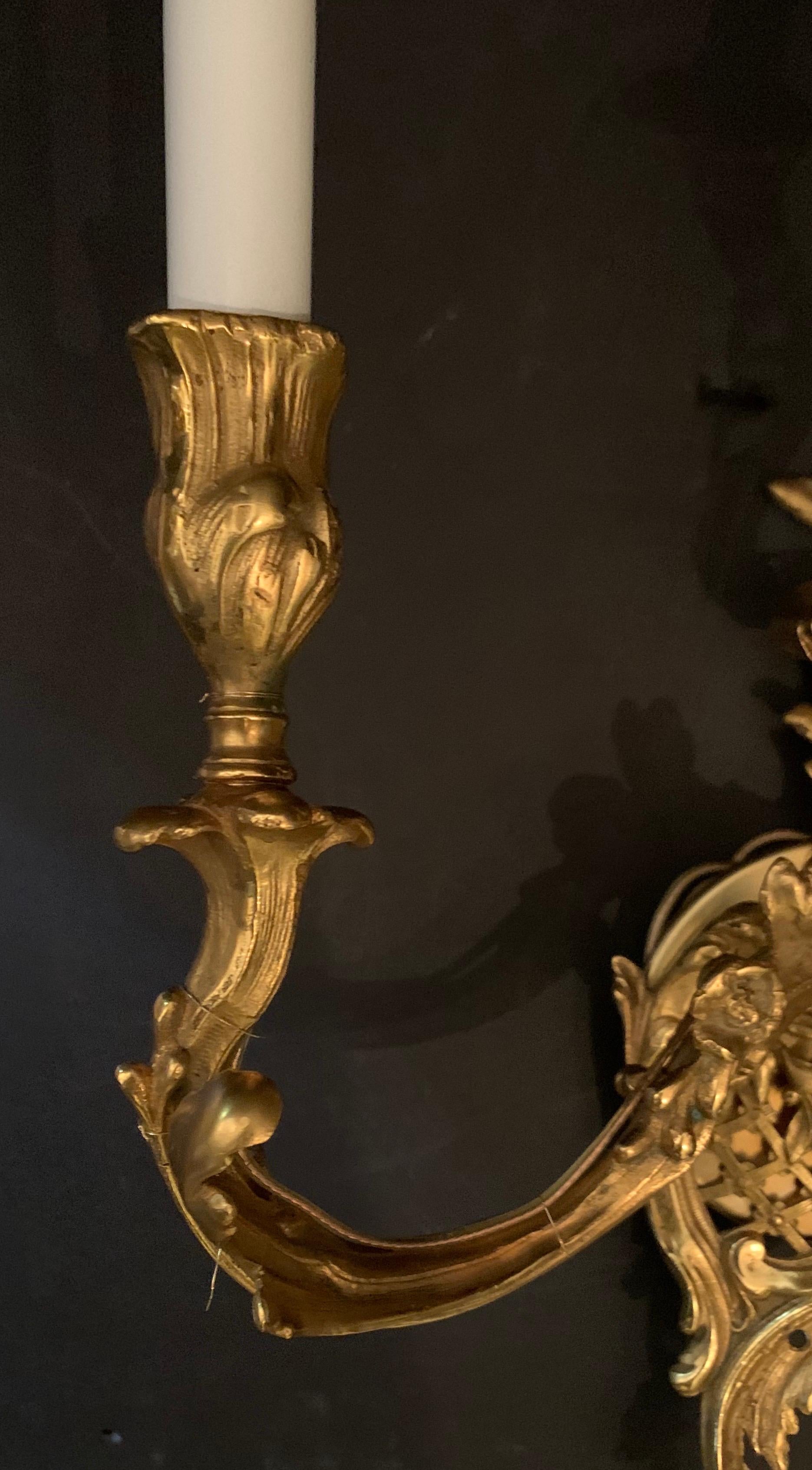 20th Century Wonderful Pair of French Dore Bronze Rococo Three Light Lattice Sconces For Sale