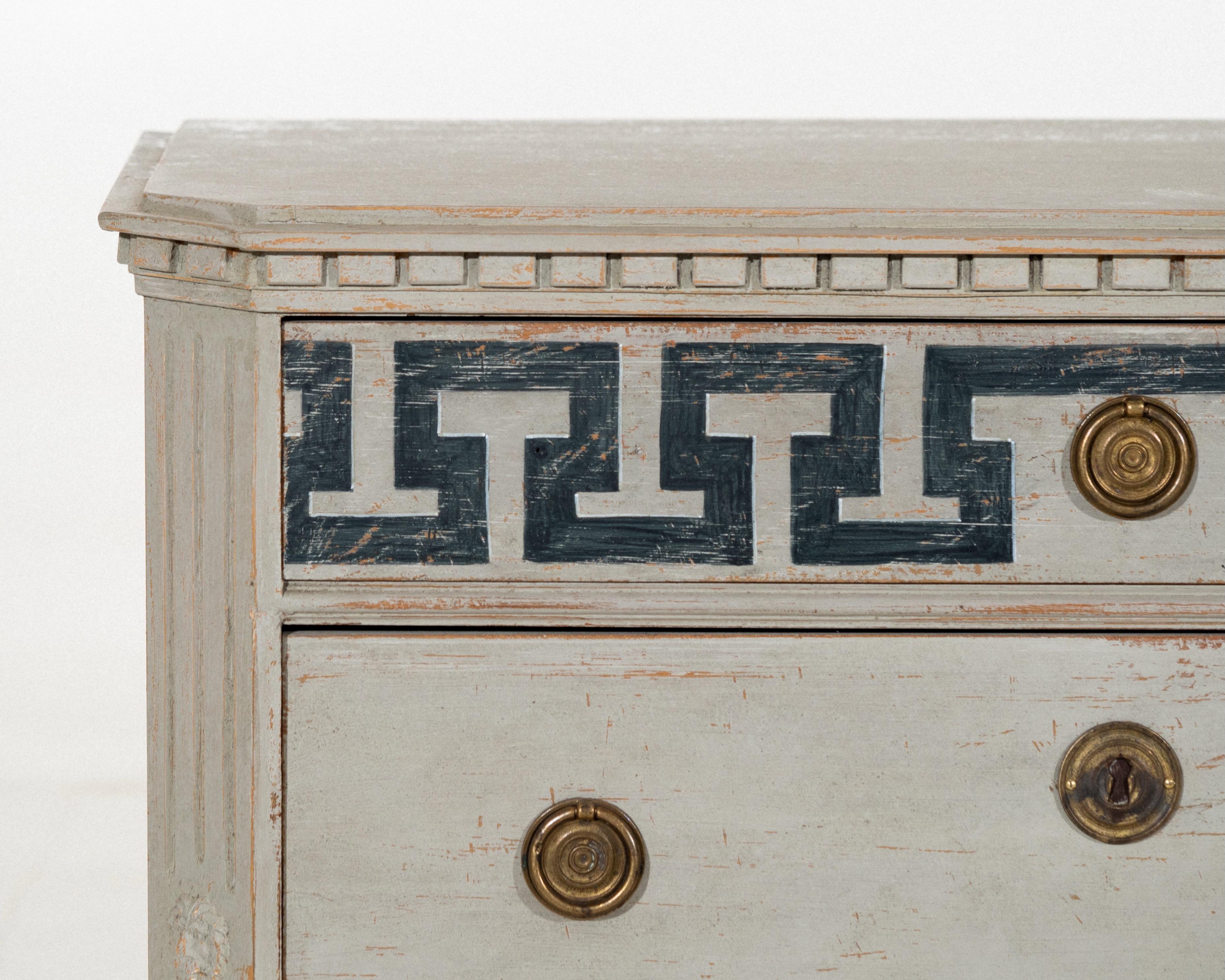 Wonderful pair of Gustavian style chests with carvings and a la grec details, circa 100 years old.