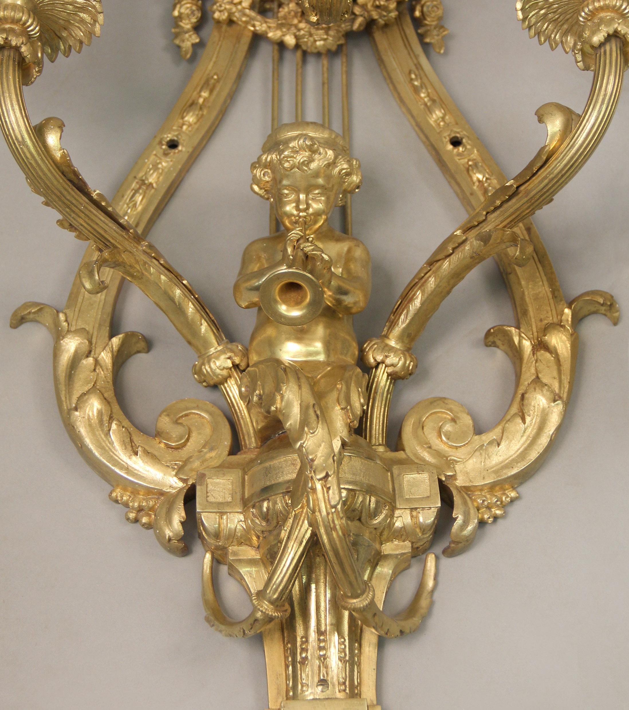 French Wonderful Pair of Late 19th Century Gilt Bronze Three Light Cherub Sconces