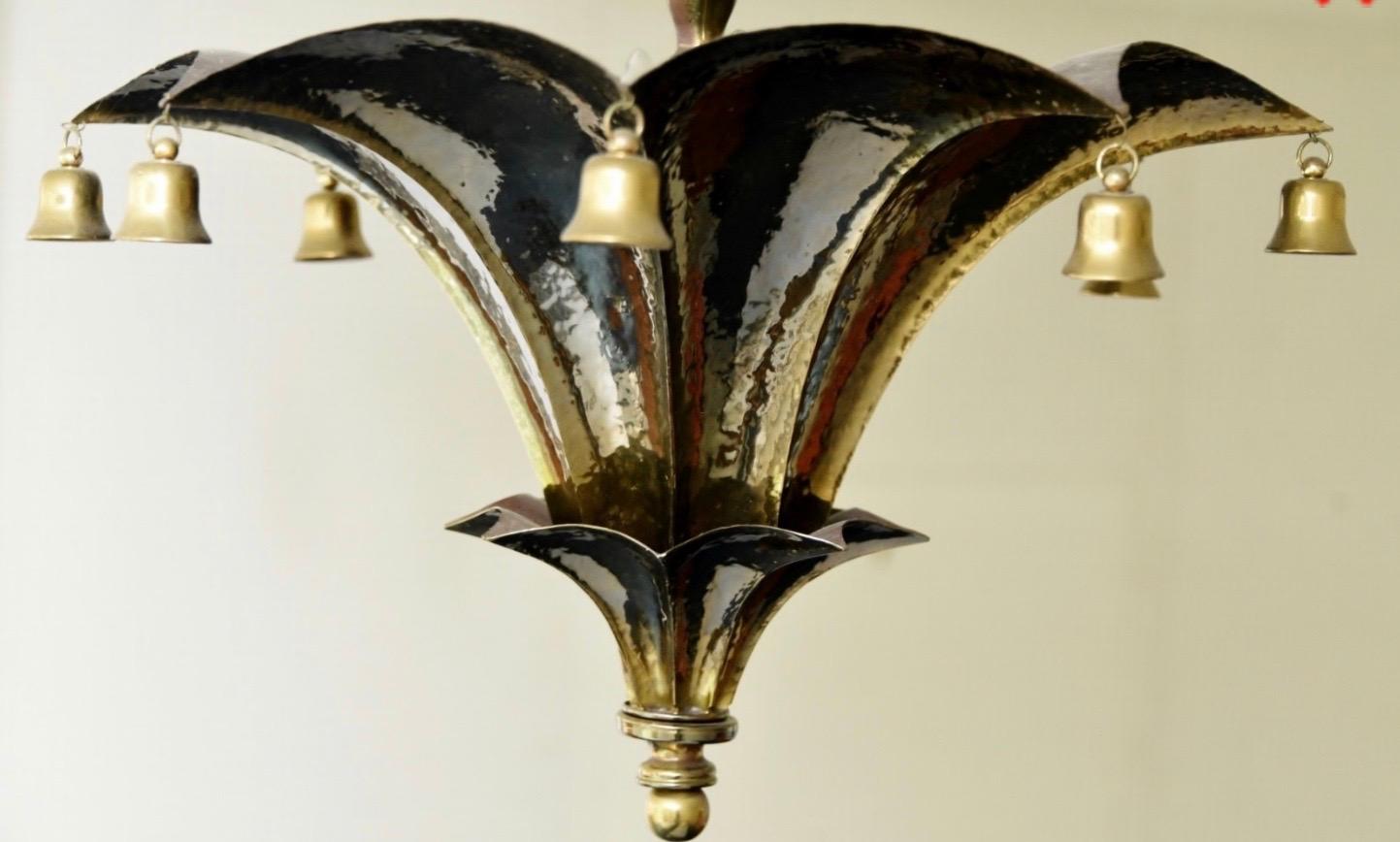 A wonderful pair of pagoda brass 4 candelabrum light fixtures with bells, semi flushmount chandeliers
In the manor of Jansen.
