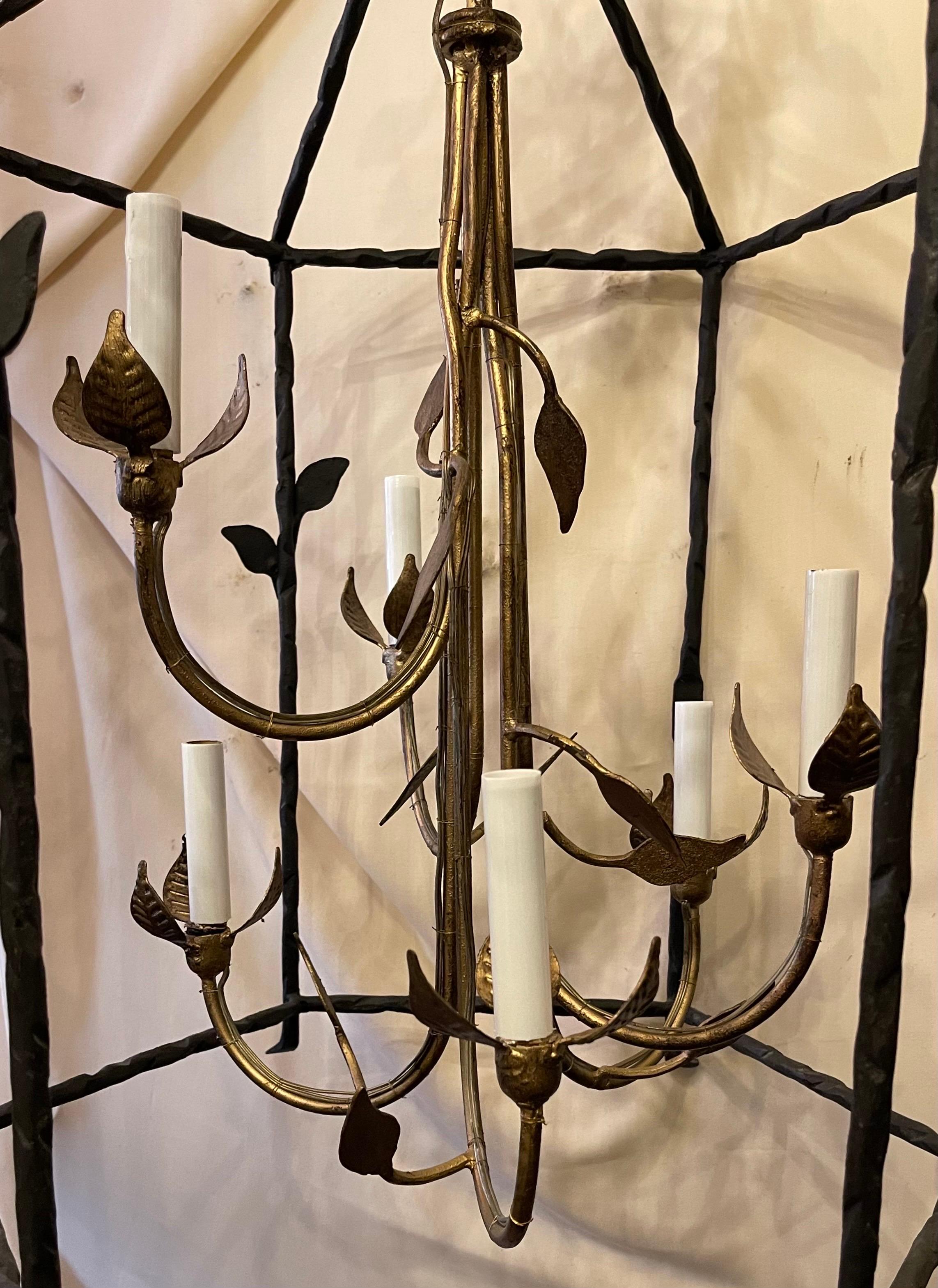 Wonderful Pair Six Light Gilt Iron Lantern Chandeliers Manner Of Giacometti In Good Condition For Sale In Roslyn, NY