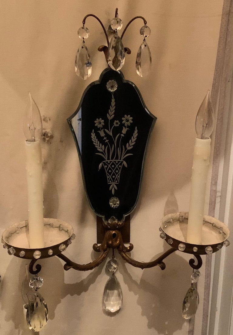 A wonderful large pair of vintage etched mirror back Baguès style tole crystal drop Italian sconces each with 2 candelabra sockets.
