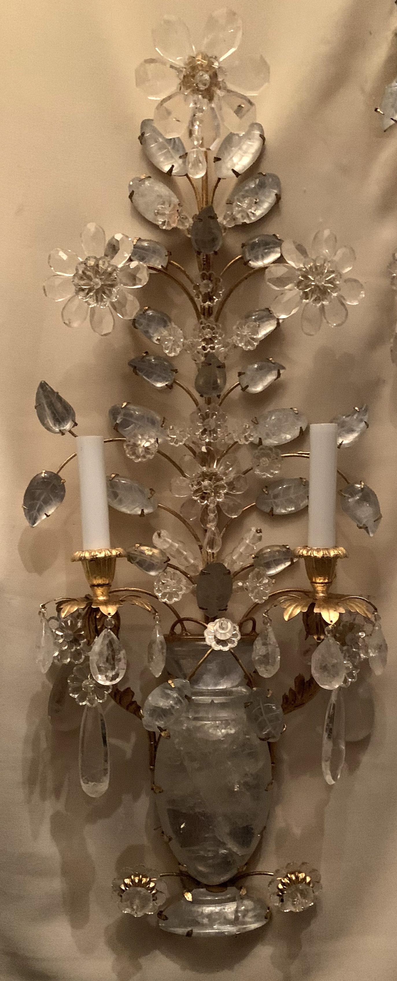 A wonderful pair of vintage gold gilt and rock crystal 2 candelabra light Baguès manner sconces
completely rewired with new sockets.