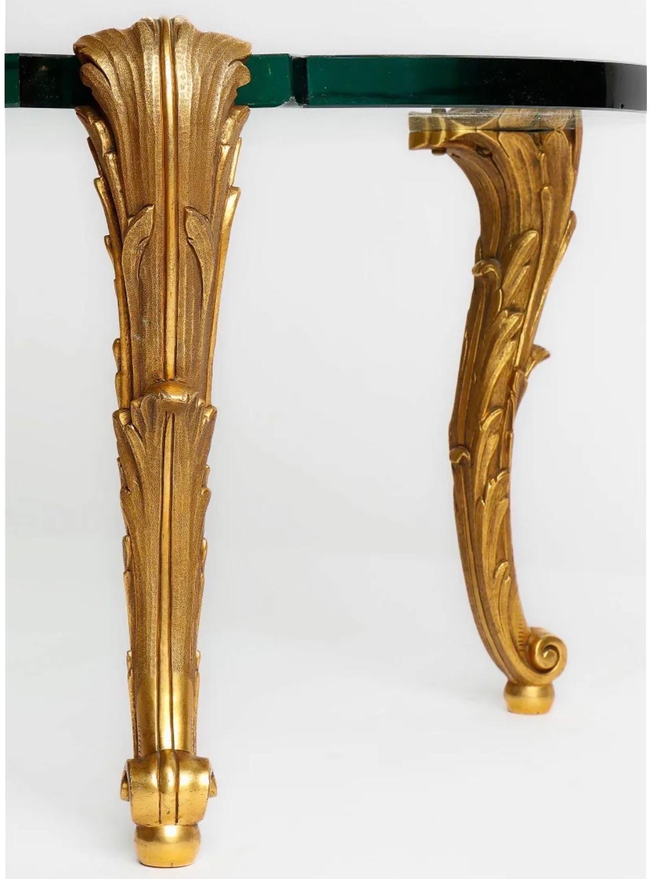 Wonderful P.E. Guerin leaf / Cartouche gilt bronze & thick oval glass coffee / cocktail table, in the Louis XV manner. Each of the heavy bronze legs, marked on the bottom of the foot. Glass does have minor imperfection, flea bite chip to