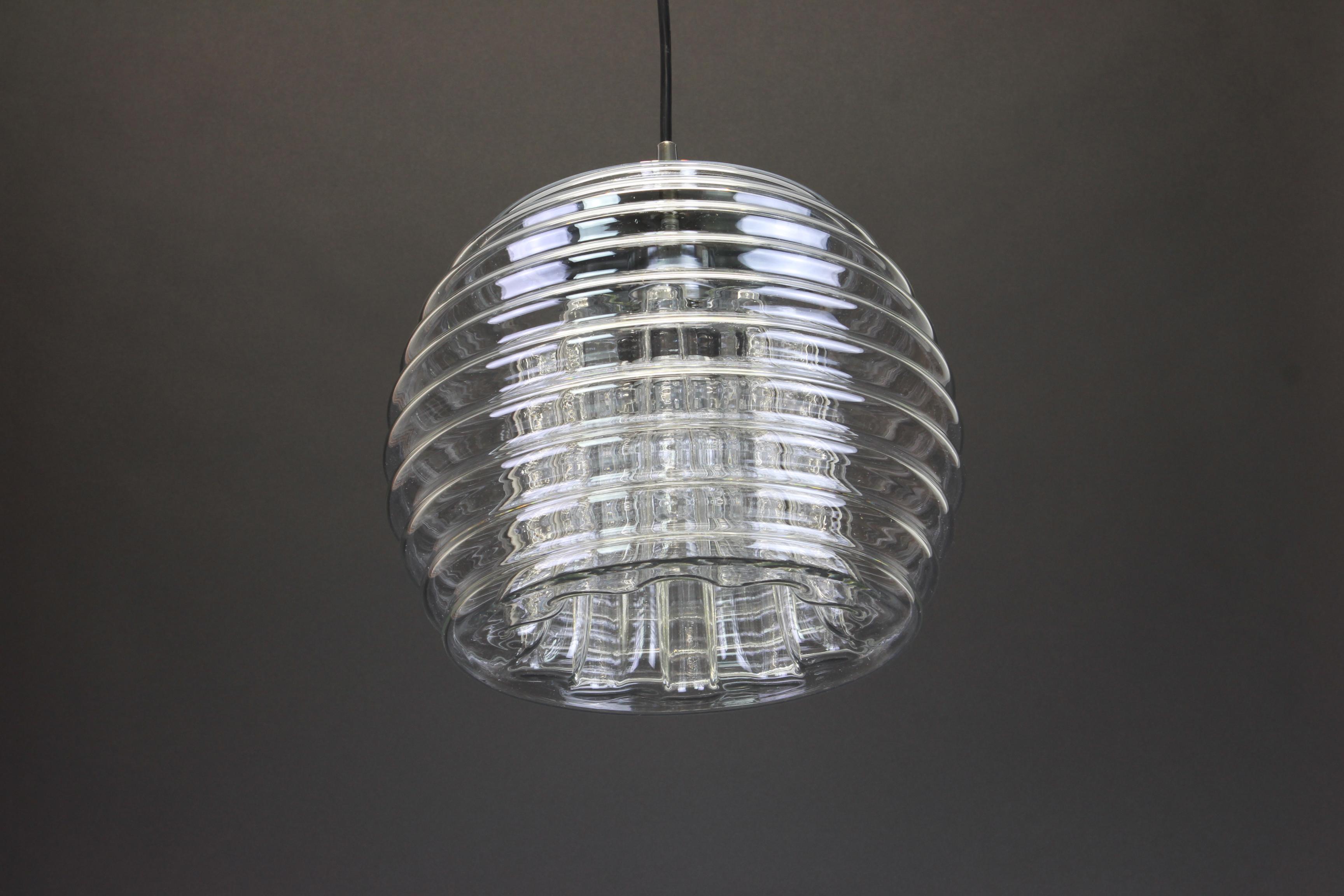 A special round biomorphic glass pendant designed by Koch & Lowy for Peill & Putzler, manufactured in Germany, circa 1970s.

Sockets: One x E27 standard bulb. (100 W max).
Drop rod can be adjusted as required, free of charge, for greater or