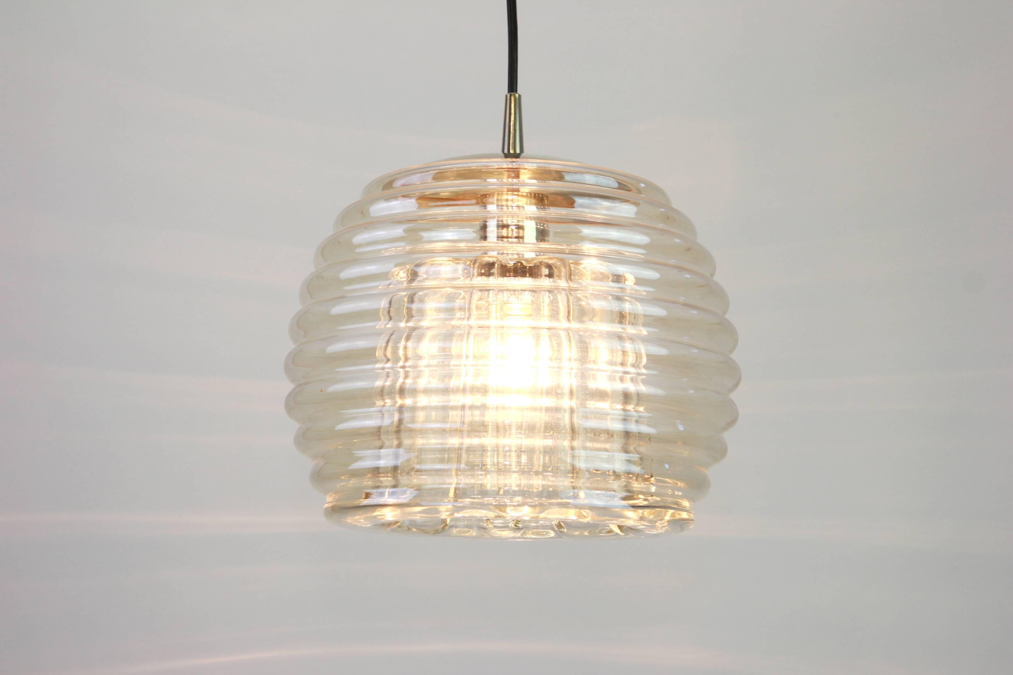 A special round biomorphic glass pendant designed by Koch & Lowy for Peill & Putzler, manufactured in Germany, circa 1970s.

Sockets: One x E27 standard bulb. 
Light bulbs are not included. It is possible to install this fixture in all countries