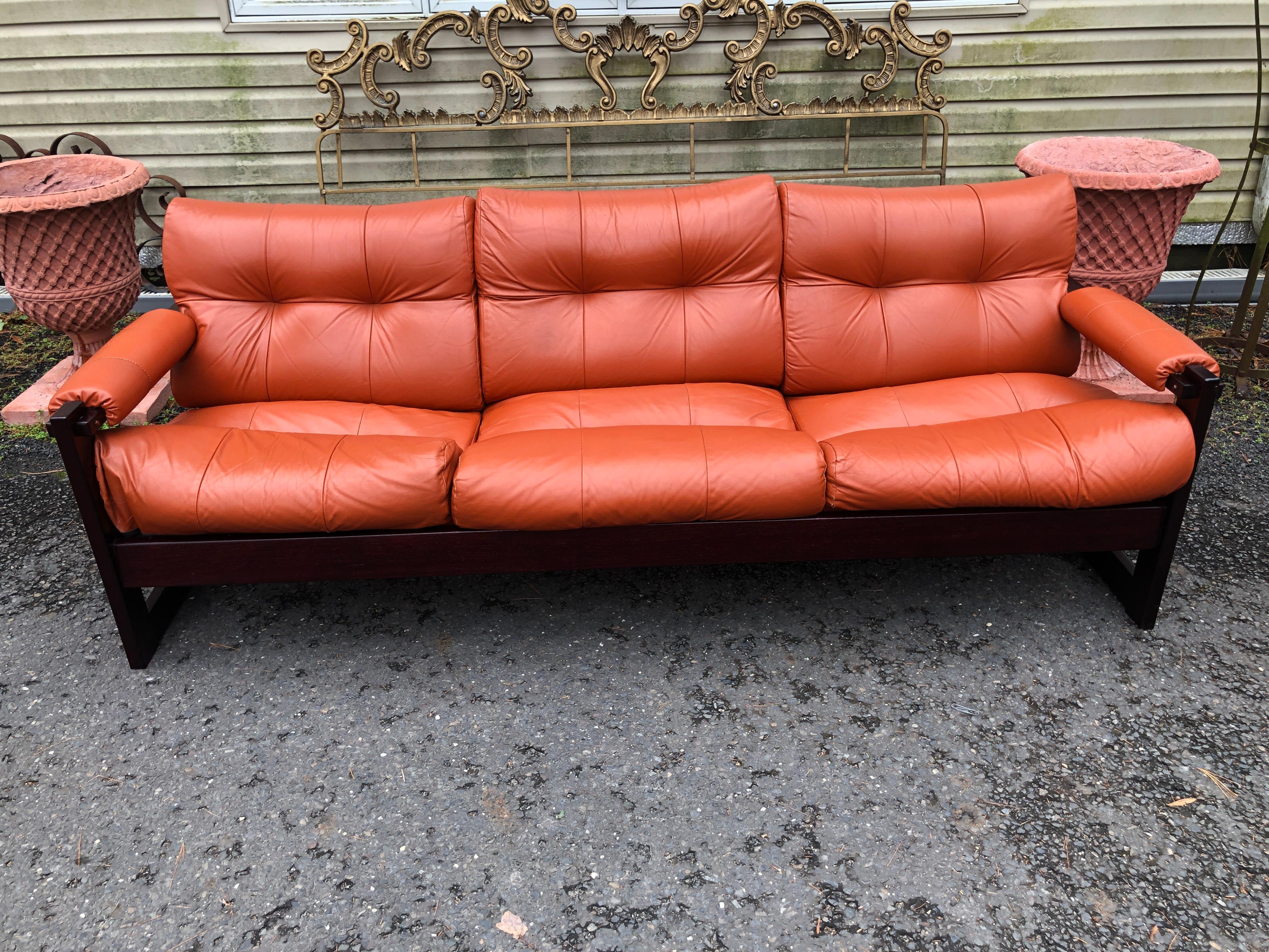 Wonderful Percival Lafer rosewood and leather 3-seater S-1 sofa.  The S-1 design features Brazilian exoticness paired with Scandinavian sensibility.  Of Lafer's designs, the S-1 is a bit more rare to find than some of his more common ones such as