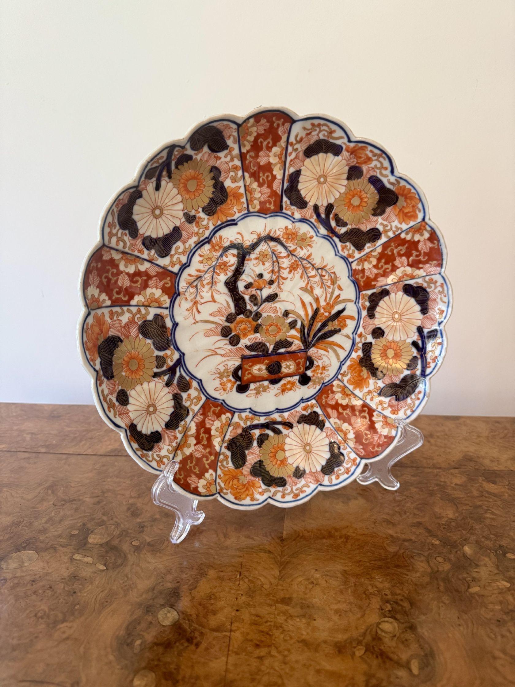 Wonderful quality antique Japanese imari plate, having a quality antique Japanese imari plate with a centre panel with flowers and trees surrounded by fantastic panels with flowers and scrolls, hand painted in vibrant red, blue, white and gold