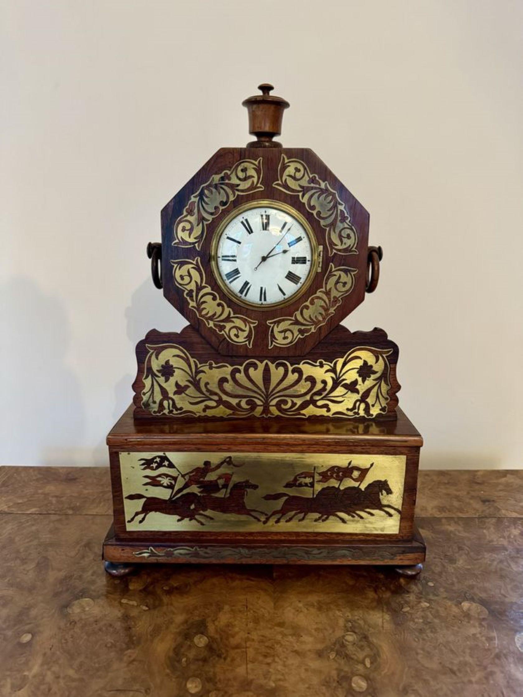 Wonderful quality antique Regency rosewood brass inlaid mantle clock, having a quality rosewood brass inlaid case decorated with horses, riders and flags, with a circular porcelain dial to the centre with Roman numerals and the original hands,
