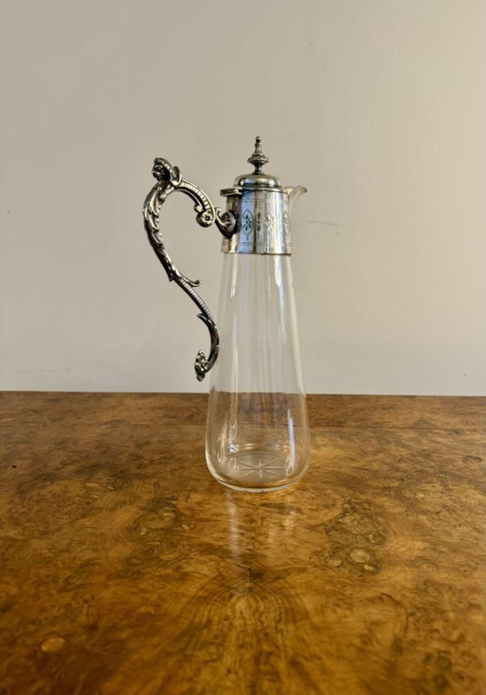 Wonderful quality antique Victorian glass and silver plated claret jug having a quality Victorian claret jug with a silver plated top, fantastic silver plated shaped spout and a shaped ornate handle to the back with a lion to the top, above a