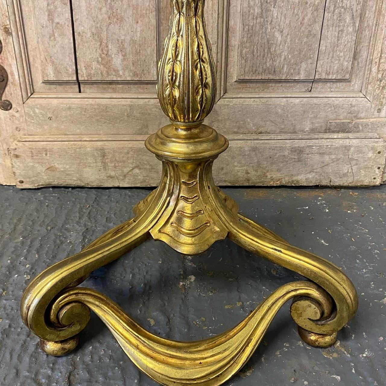 A wonderful quality French gilt standard lamp dating to the 1920s. Lovely organic design, heavy weight so stable and original perfect glass tulip shape shade.
This will need to be completely re wired. In excellent original condition for the