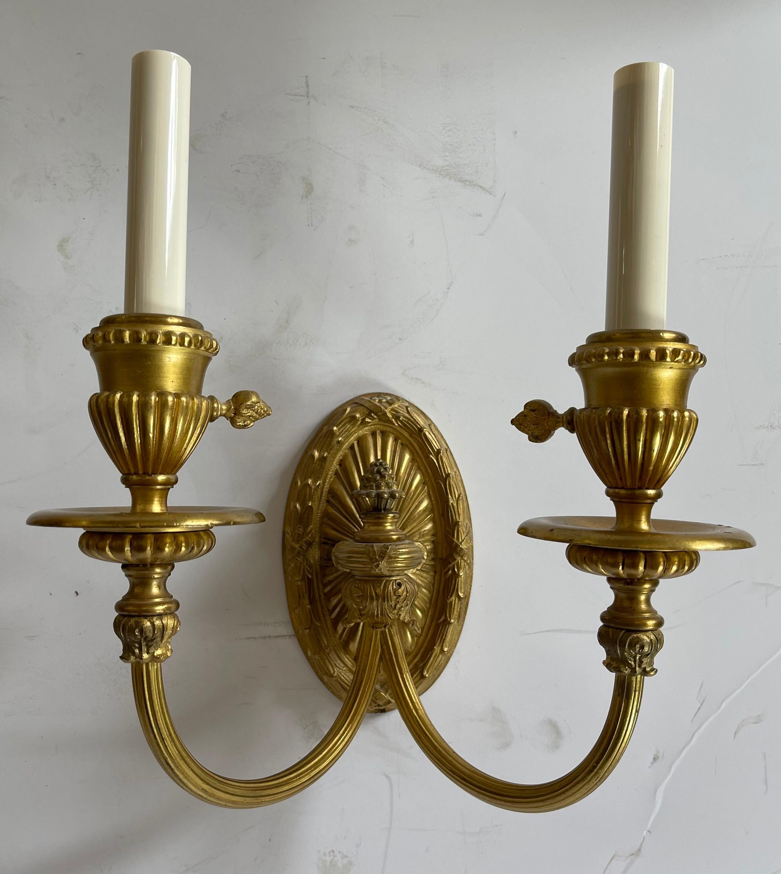 A wonderful Regency / neoclassical form pair of urn medallion dore bronze Empire two candelabra socket sconces in the manner of E.F. Caldwell
Rewired and ready to install with mounting brackets.