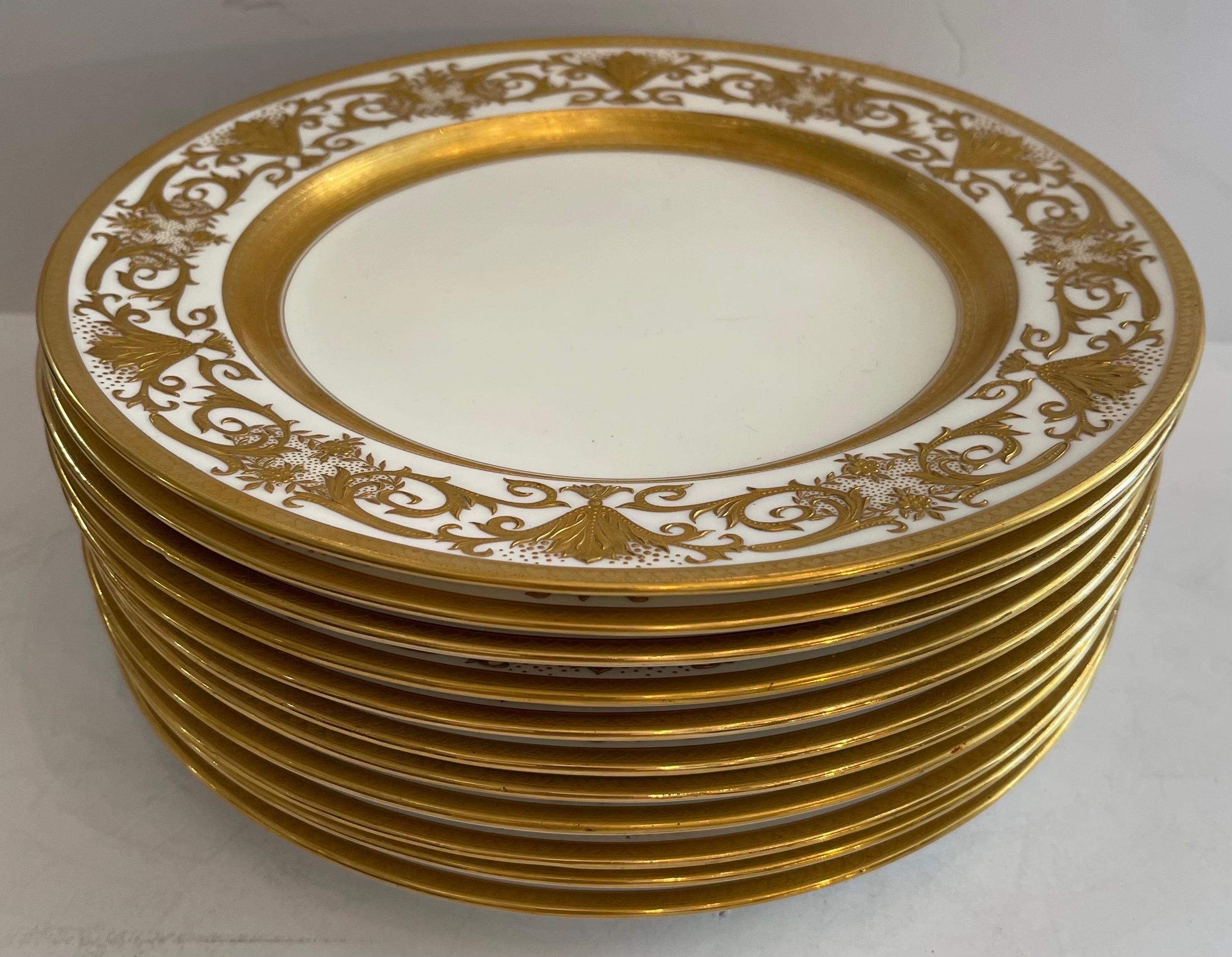 A Wonderful service set of 12 Minton dinner plates having raised gold gilded over a white plate with regency urns and filigree pattern.
In excellent display Collectors condition
Measures: Diameter 10 1/2 inches.