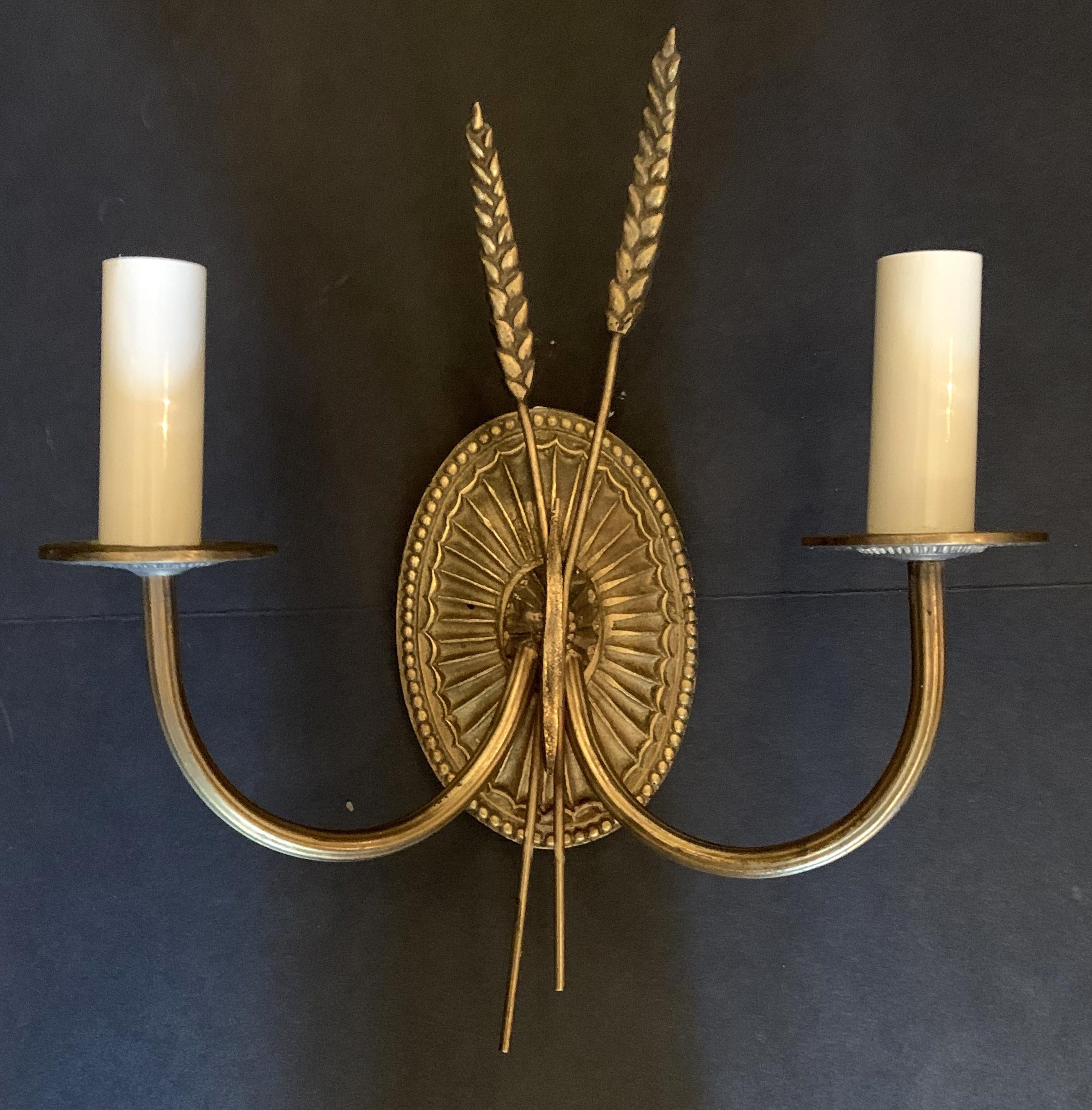 A wonderful Pair of bronze wheat form oval back Regency / classical 2 candelabra light sconces
In the manner of Caldwell
