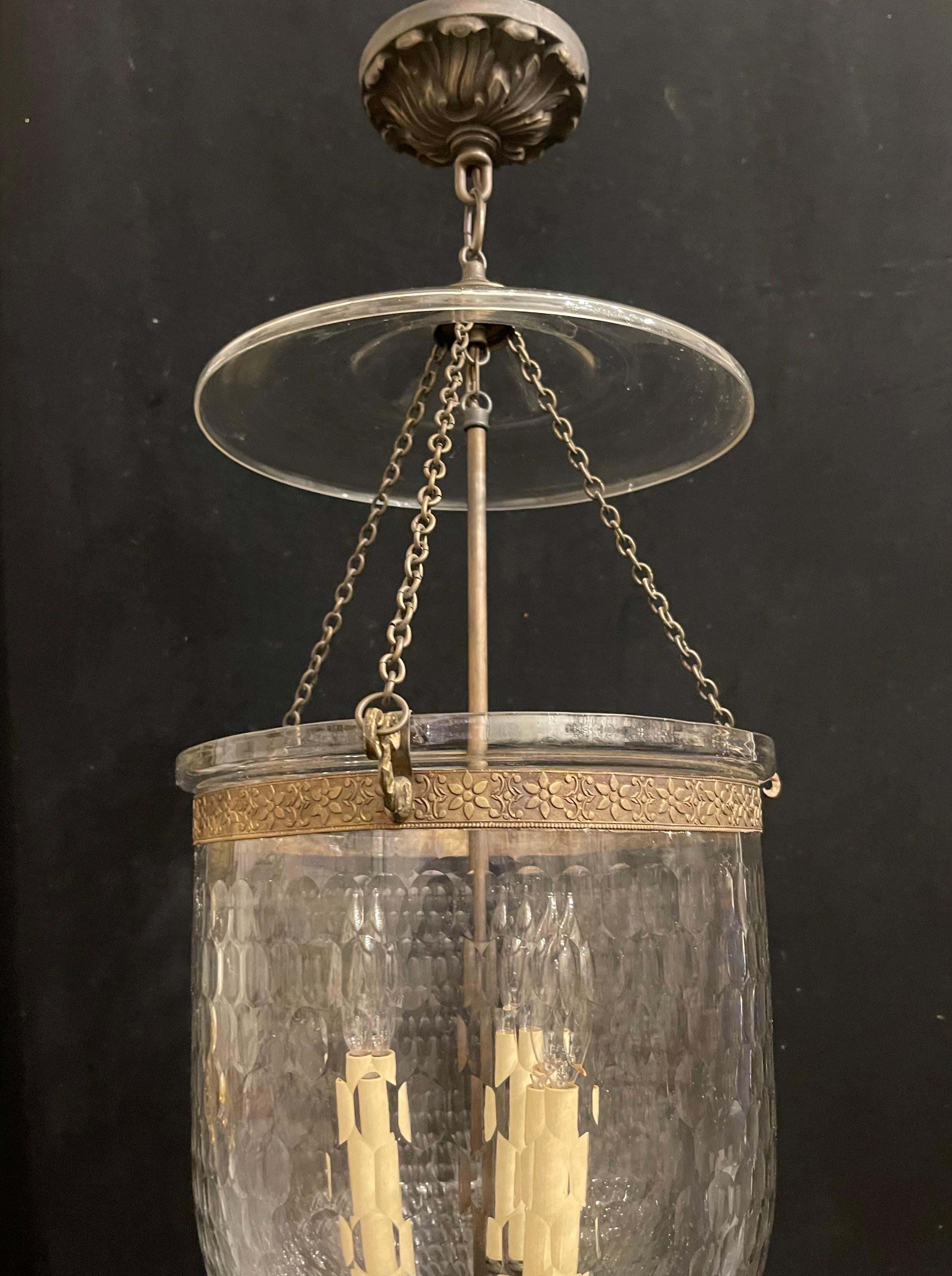 A Wonderful Set Of 4 Vaughan Regency Style 3 Candelabra Light Bronze And Bubble Blown Glass Hall Lantern Light Fixtures

Each Fixture Sold Separately
4 Available