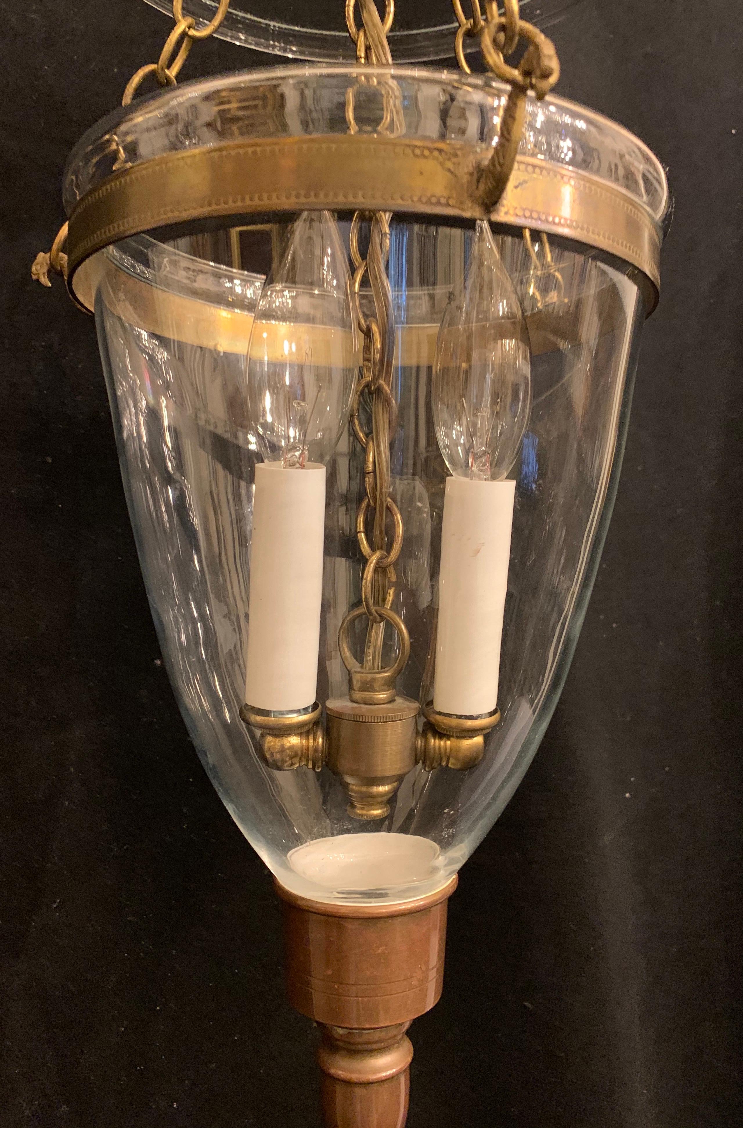 A wonderful set of 3 brass and blown glass English style bell jar lantern 2 light fixtures
Each sold separately.