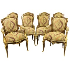Merveilleux ensemble de huit chaises de salle à manger montées en bronze doré d'après François Linke