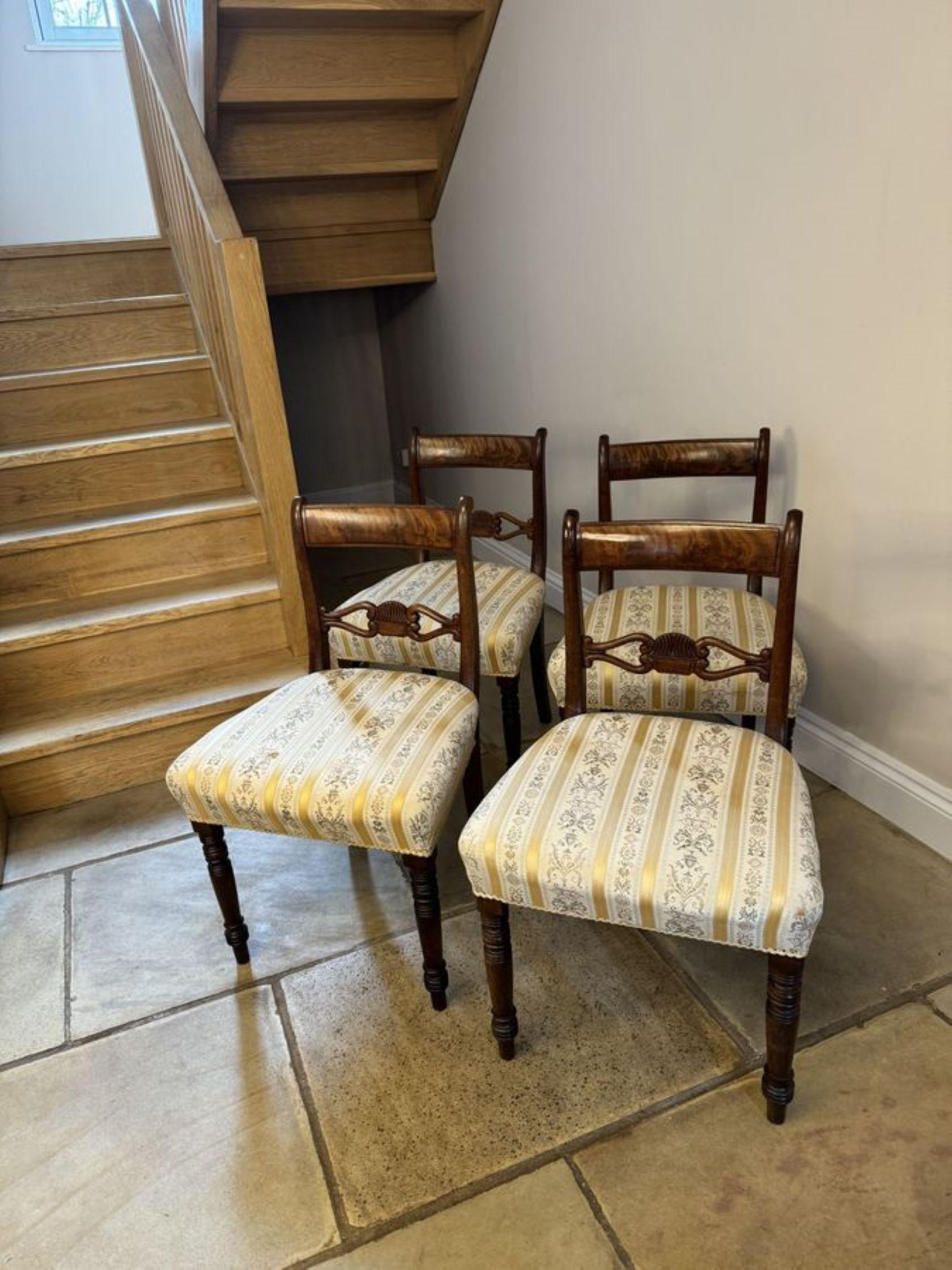 Wonderful set of four antique Regency mahogany dining chairs, having a figured mahogany top carved mahogany centre splat stuff over seats, standing on turned tapering legs to the front and out swept back legs.

D. 1830