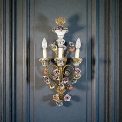Wonderful set of Four Gilt Bronze Sconces with Colorful Porcelain Flowers