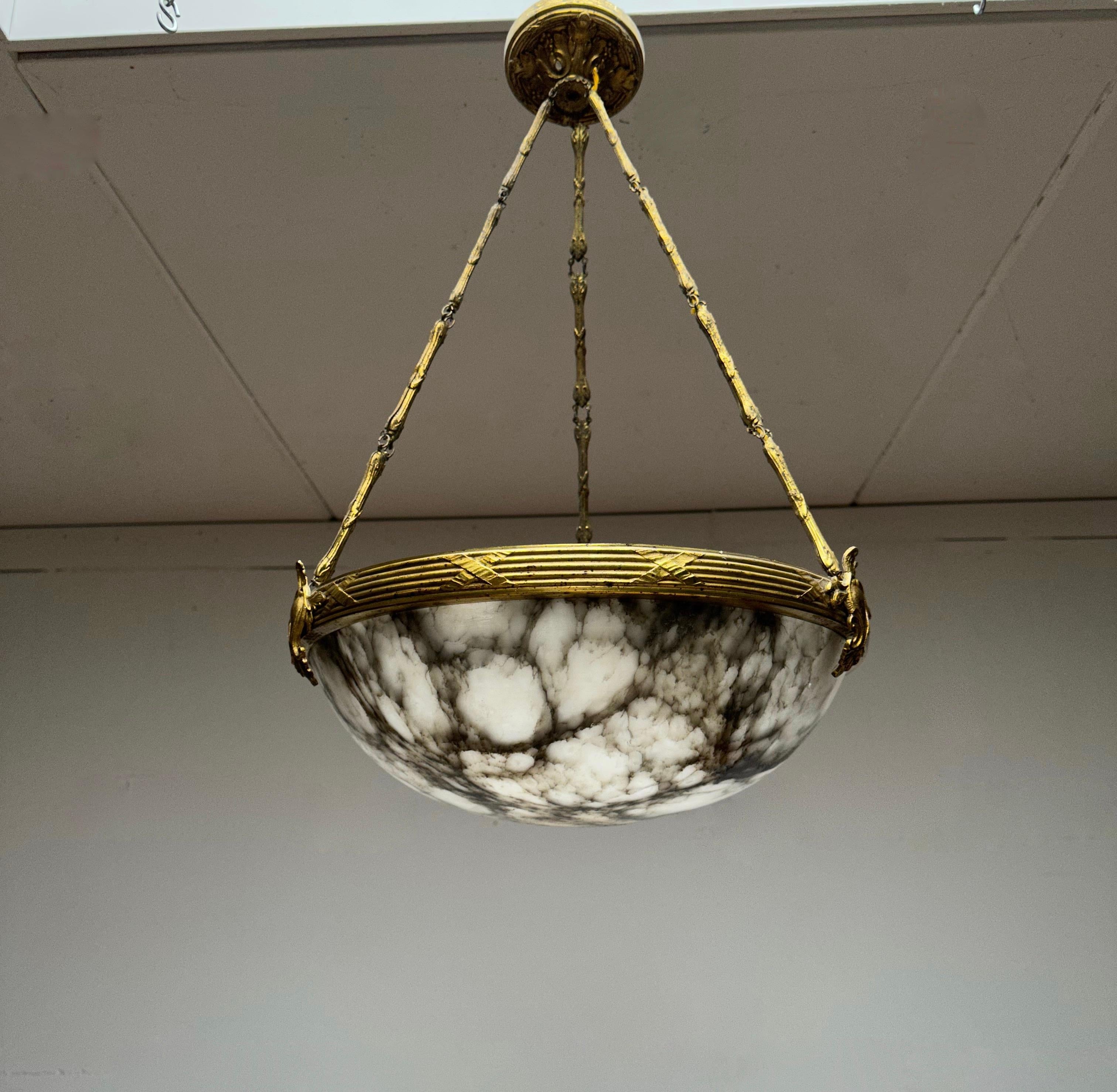 Antique and practical size, Classical French, 3-light chandelier in superb condition.

With early 20th century lighting as one of our specialities, we were again thrilled to find an unique alabaster pendant with a striking alabaster stone shade.